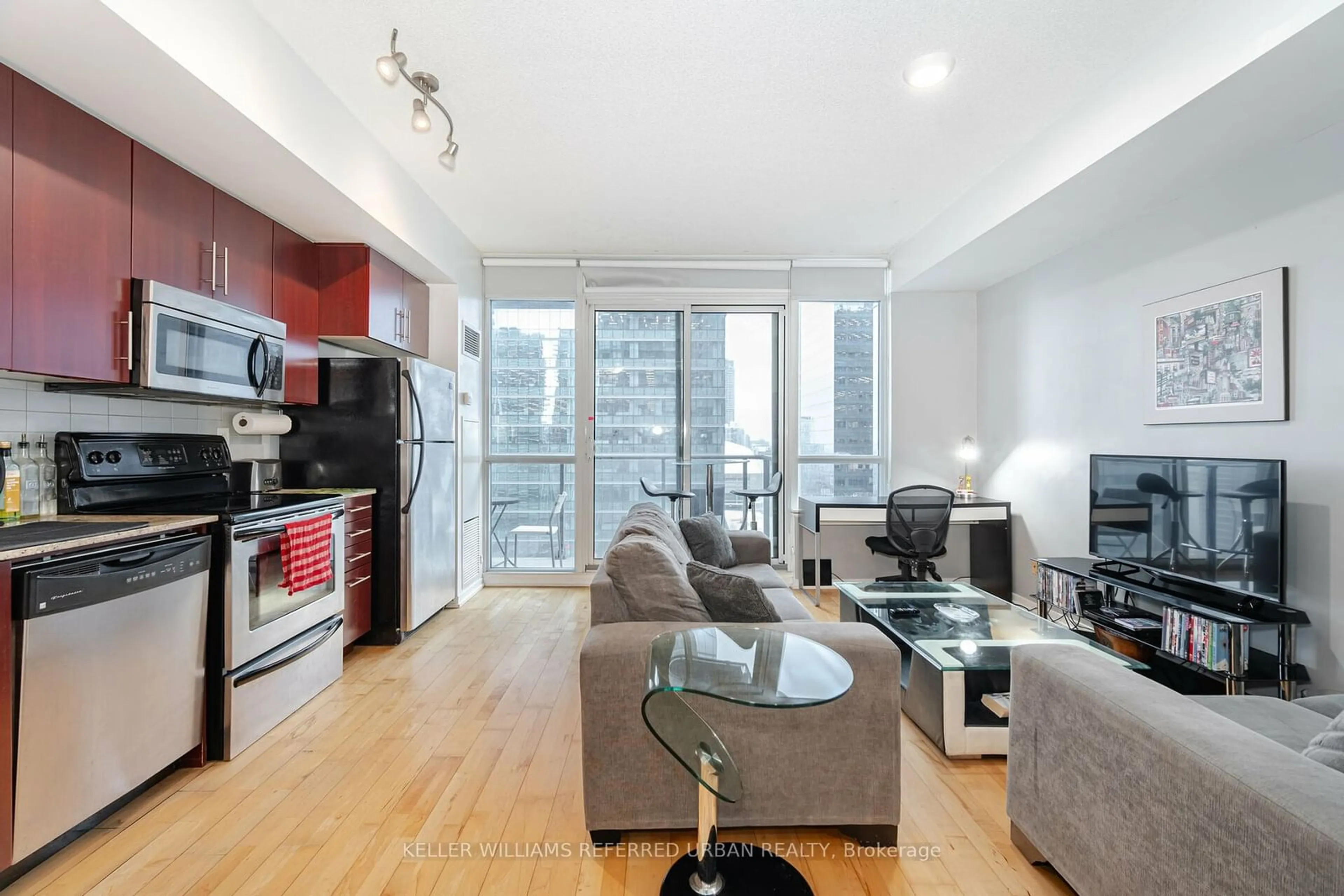 Living room with furniture, unknown for 65 Bremner Blvd #2304, Toronto Ontario M5J 0A7