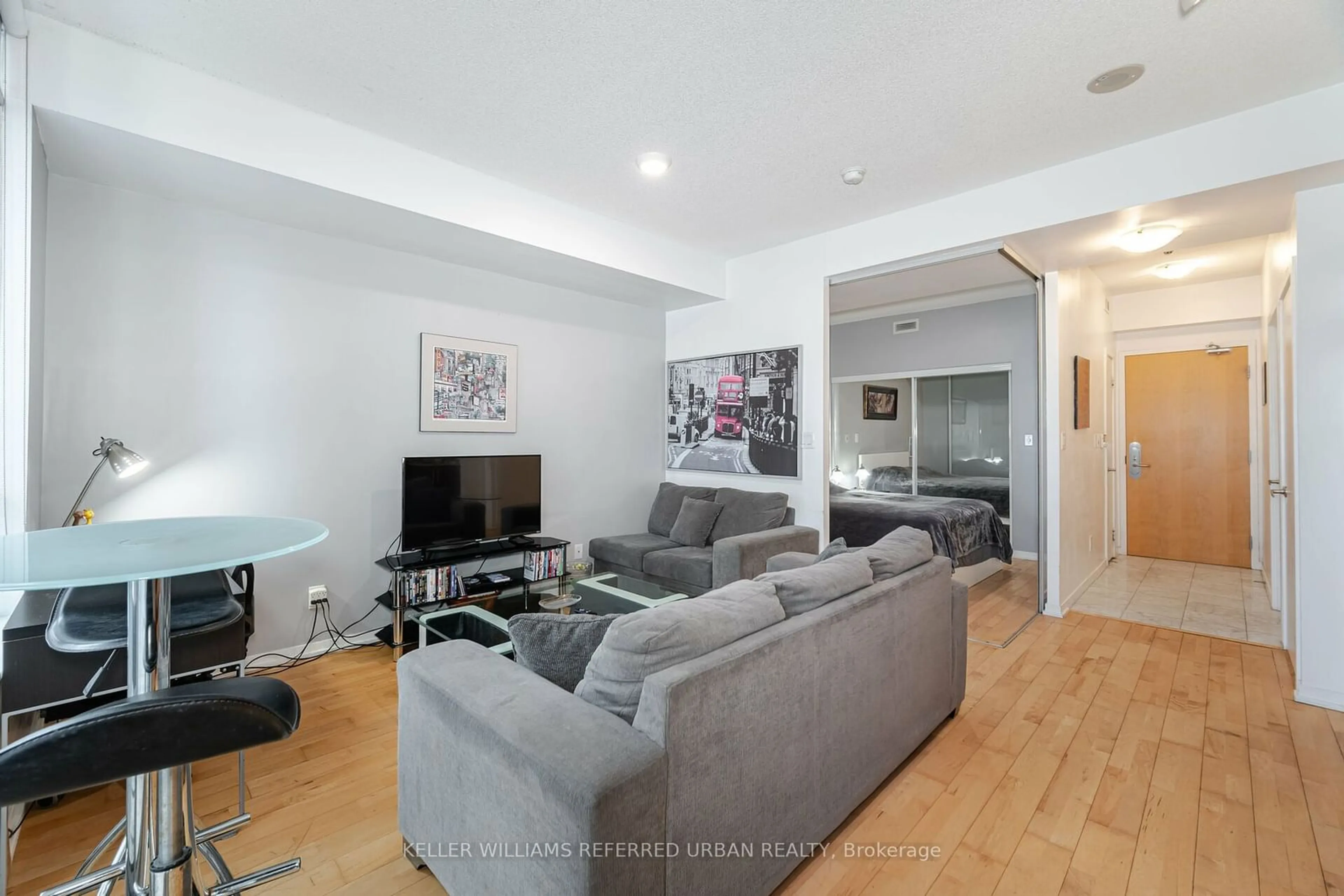 Living room with furniture, unknown for 65 Bremner Blvd #2304, Toronto Ontario M5J 0A7