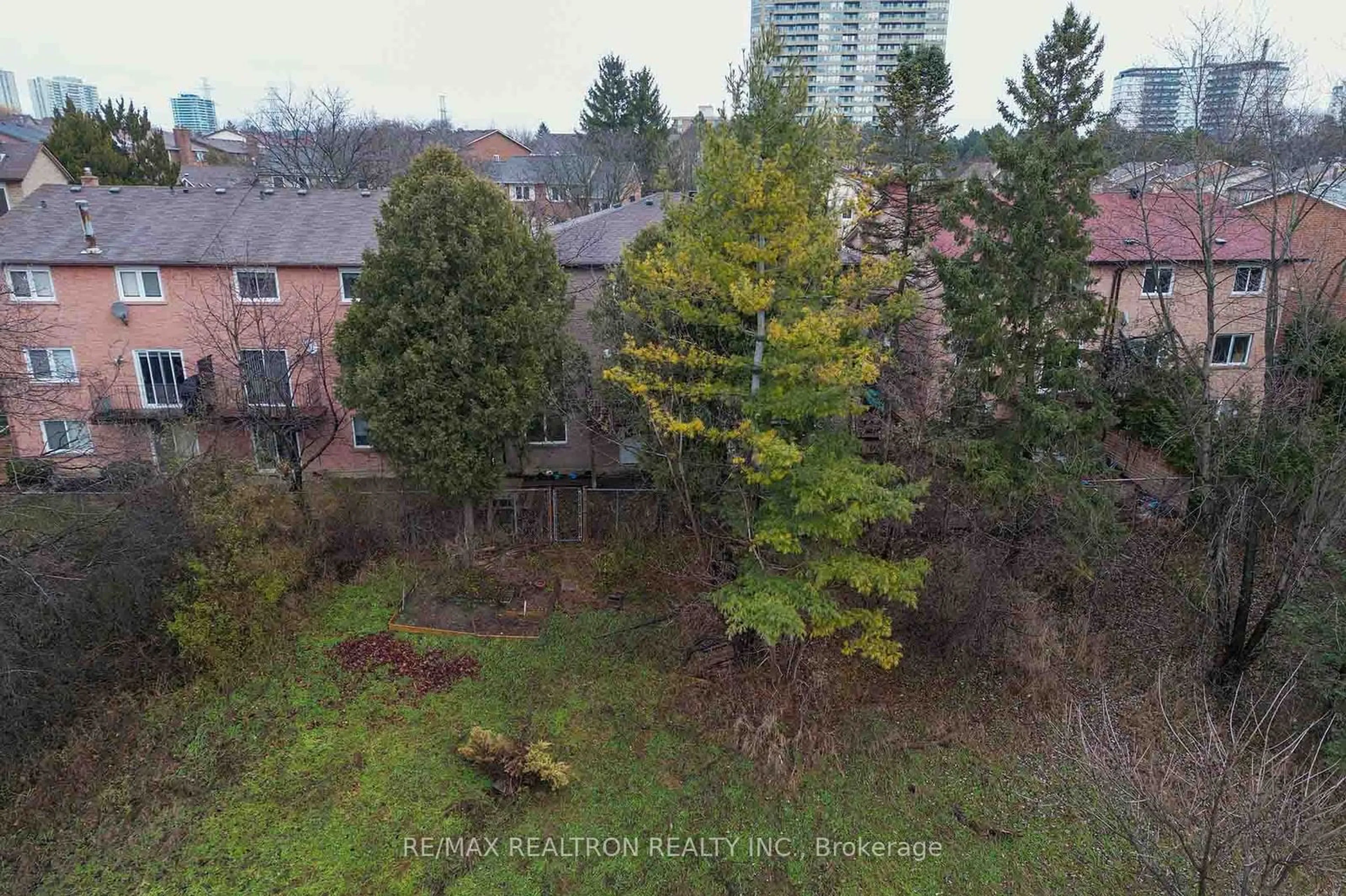 A pic from outside/outdoor area/front of a property/back of a property/a pic from drone, forest/trees view for 111 Robert Hicks Dr, Toronto Ontario M2R 3R2