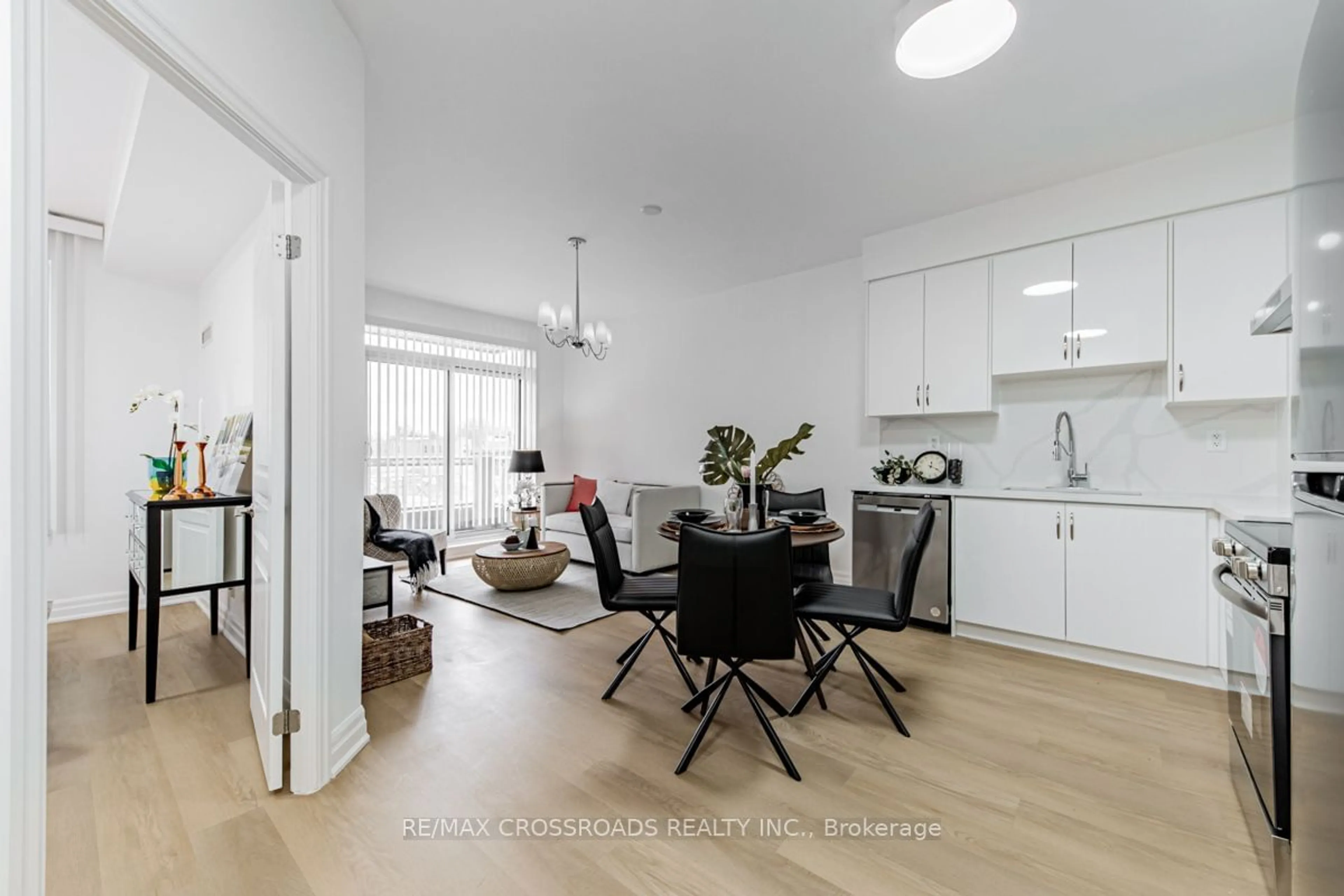 Open concept kitchen, wood/laminate floor for 777 Steeles Ave #211, Toronto Ontario M2R 3Y4