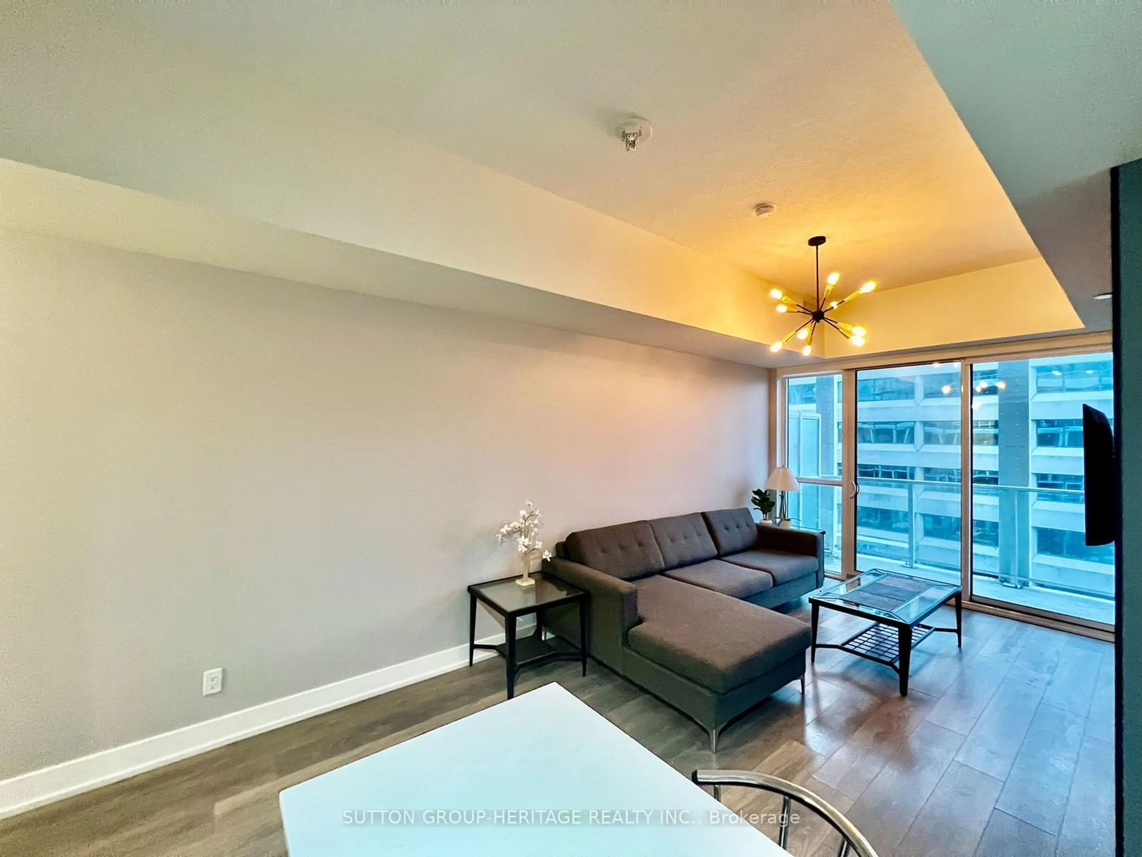 Living room with furniture, wood/laminate floor for 180 Fairview Mall Dr #502, Toronto Ontario M2J 0G4