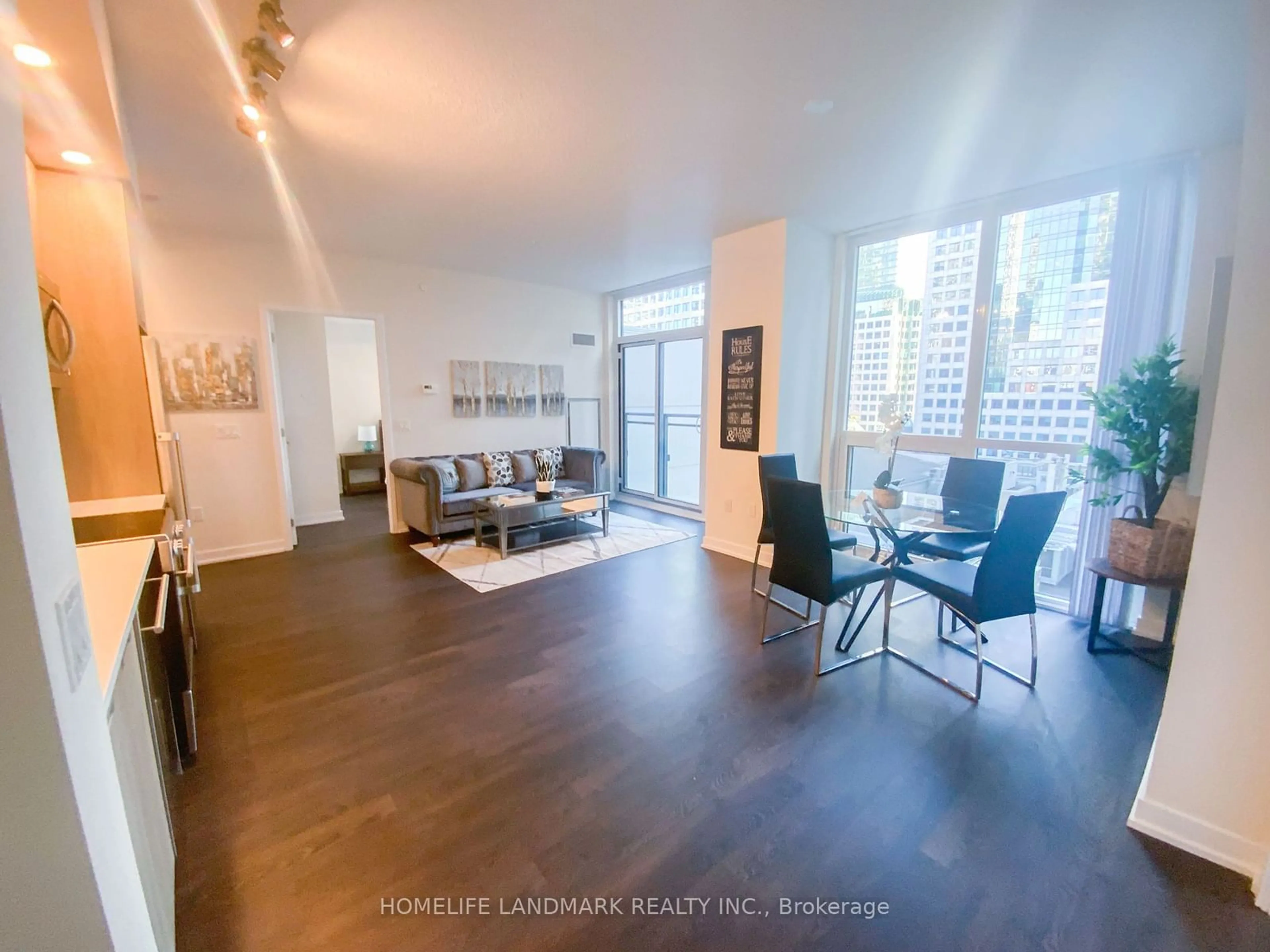 Living room with furniture, wood/laminate floor for 99 John St #803, Toronto Ontario M5V 0S6