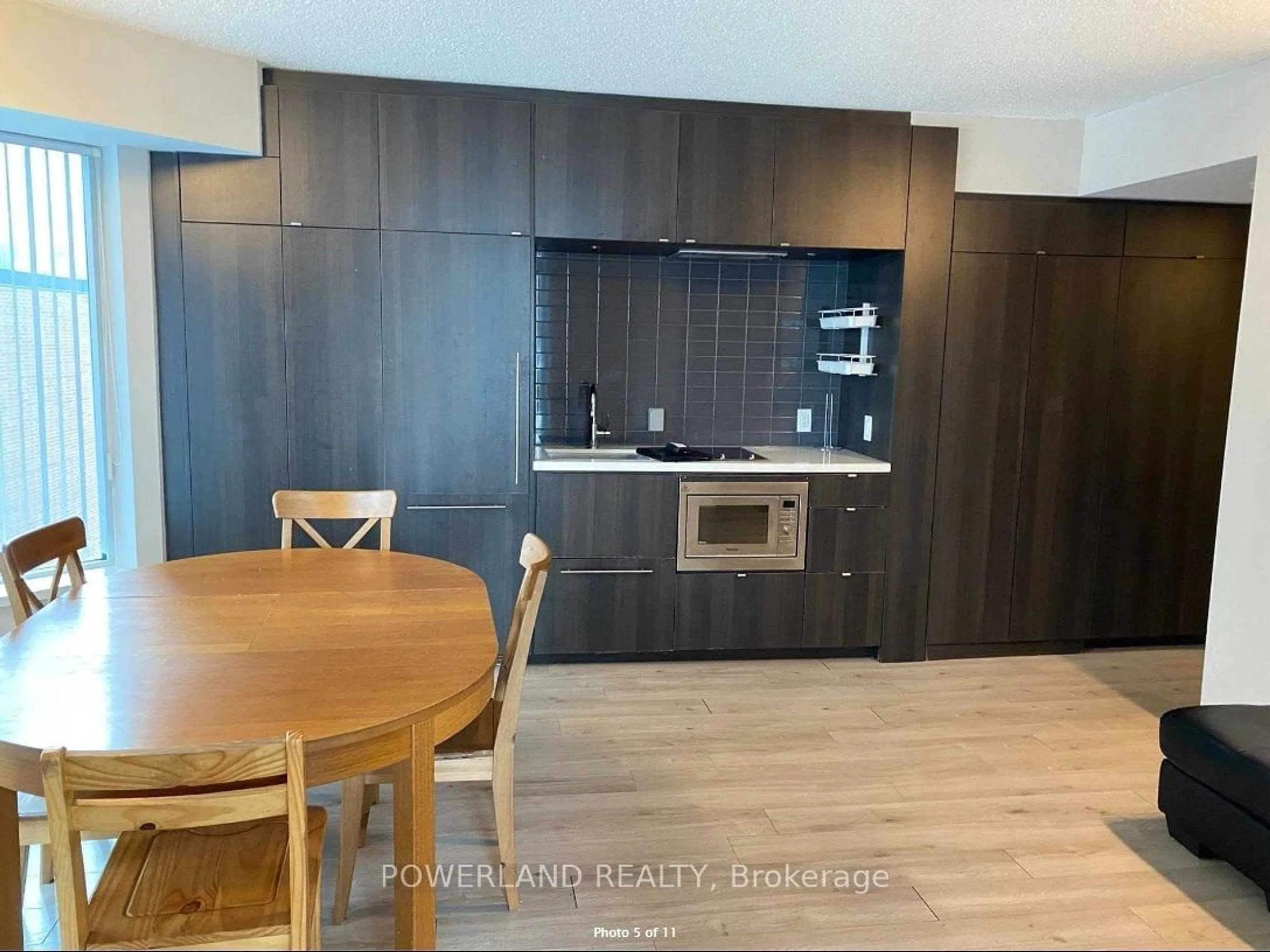 Open concept kitchen, wood/laminate floor for 155 Yorkville Ave #604, Toronto Ontario M5R 1C4