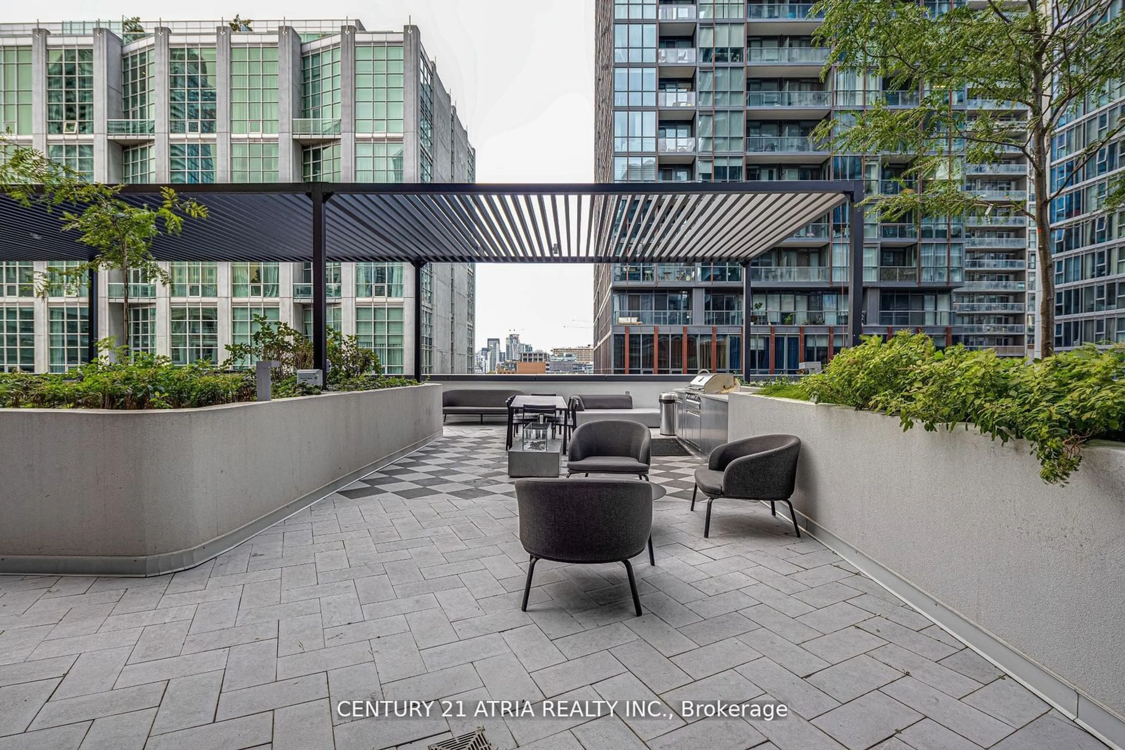 Patio, city buildings view from balcony for 55 Mercer St #308, Toronto Ontario M5V 0W4