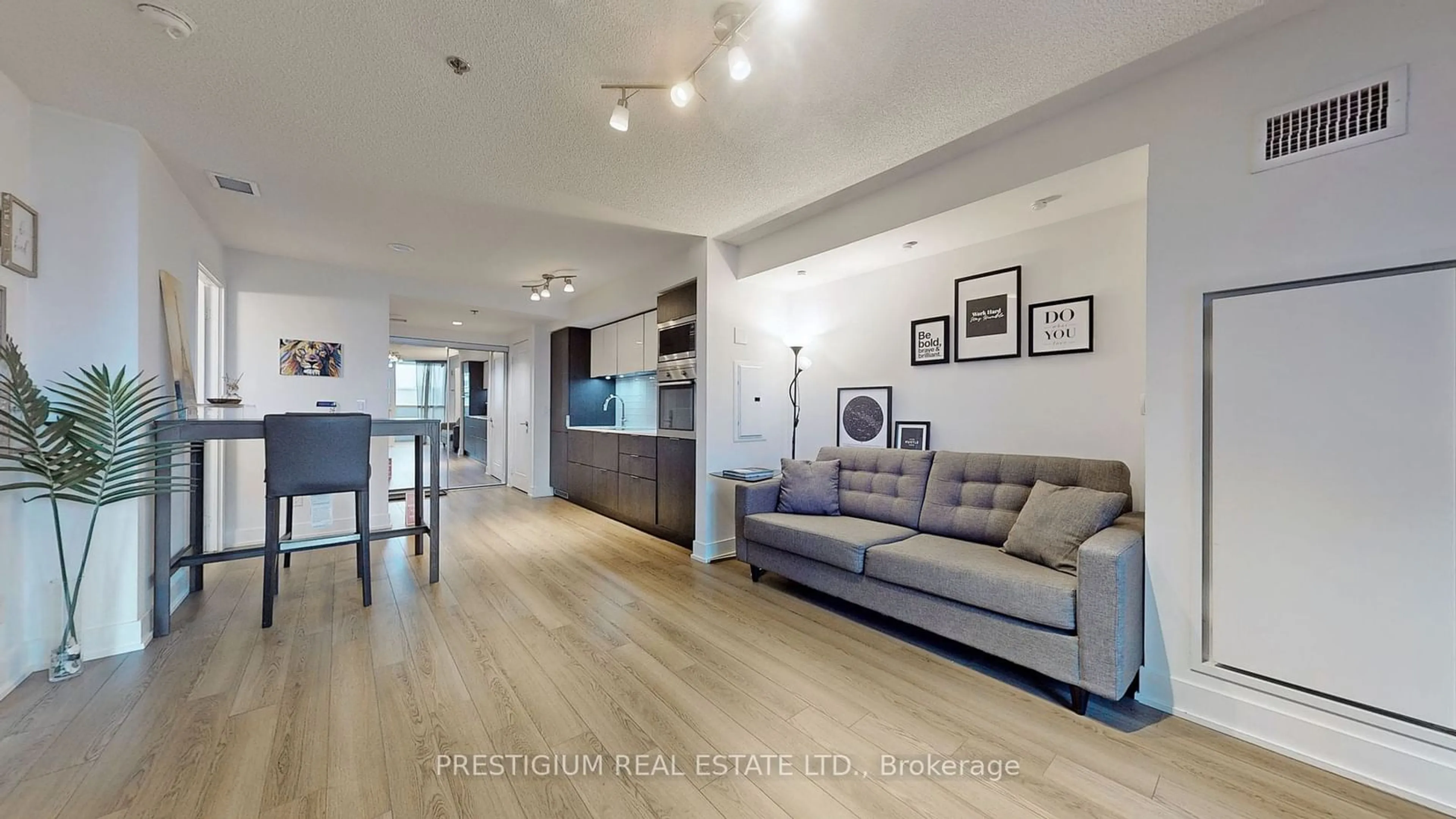 Living room with furniture, wood/laminate floor for 318 Richmond St #905, Toronto Ontario M5V 0B4