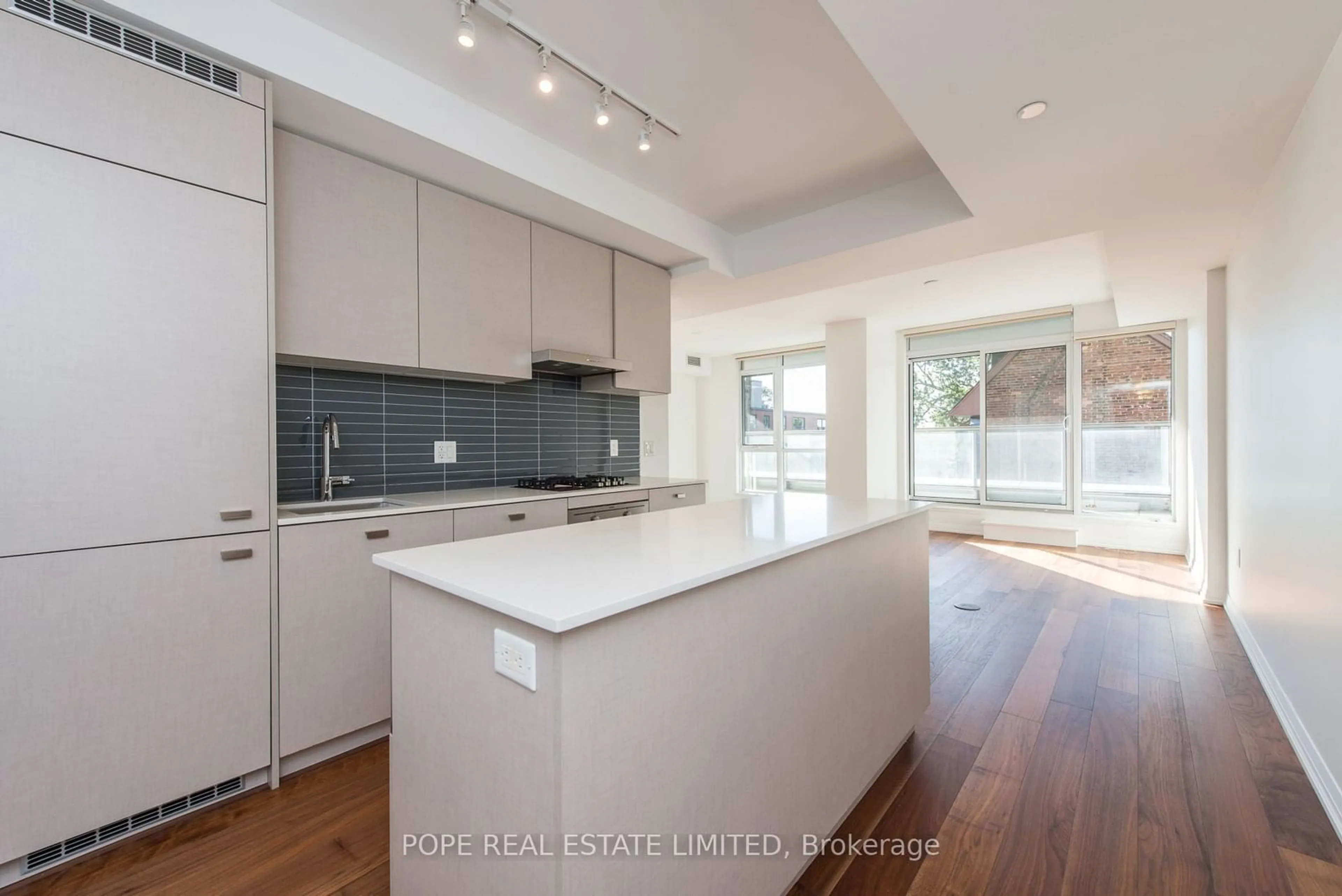 Open concept kitchen, unknown for 835 St Clair Ave #208, Toronto Ontario M6C 0A8