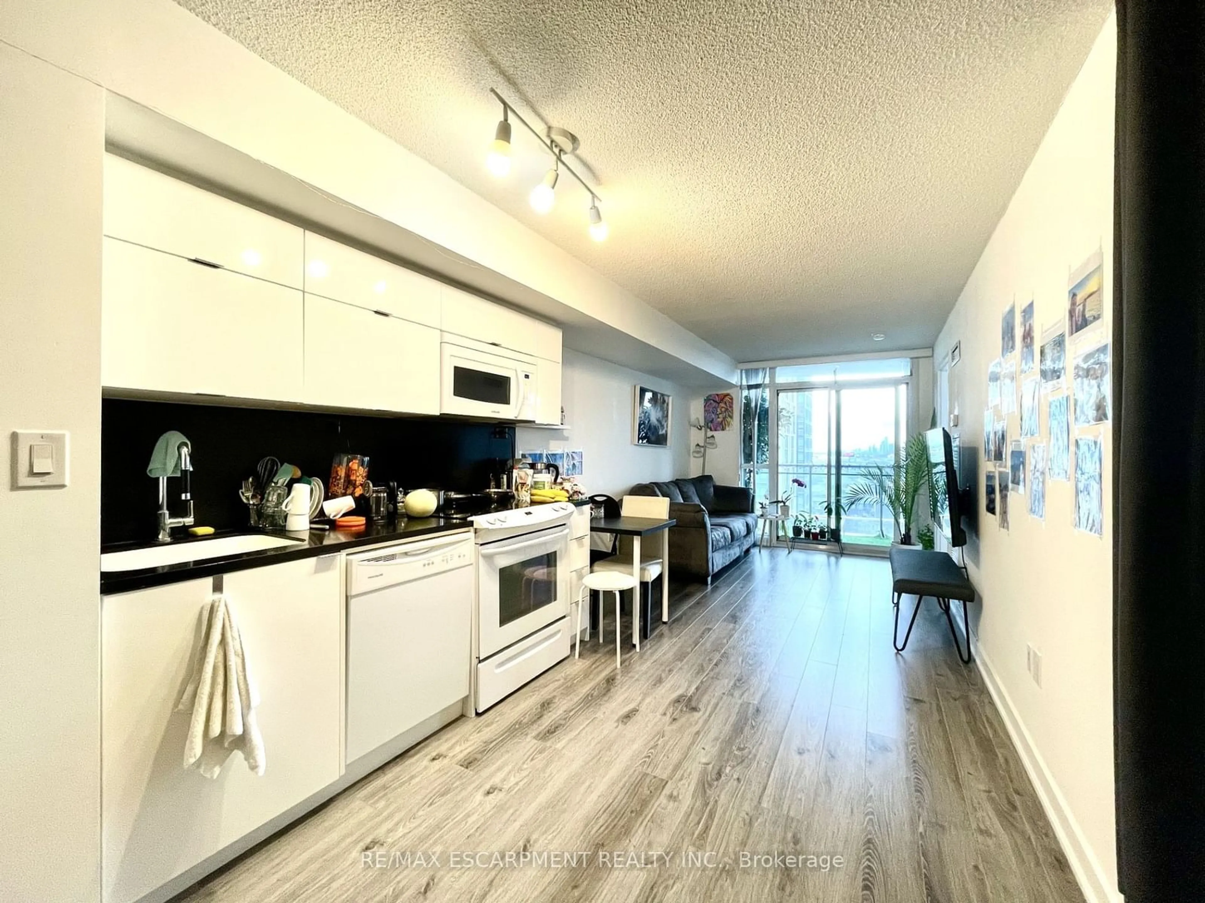 Open concept kitchen, wood/laminate floor for 21 Iceboat Terr #1510, Toronto Ontario M5V 4A9