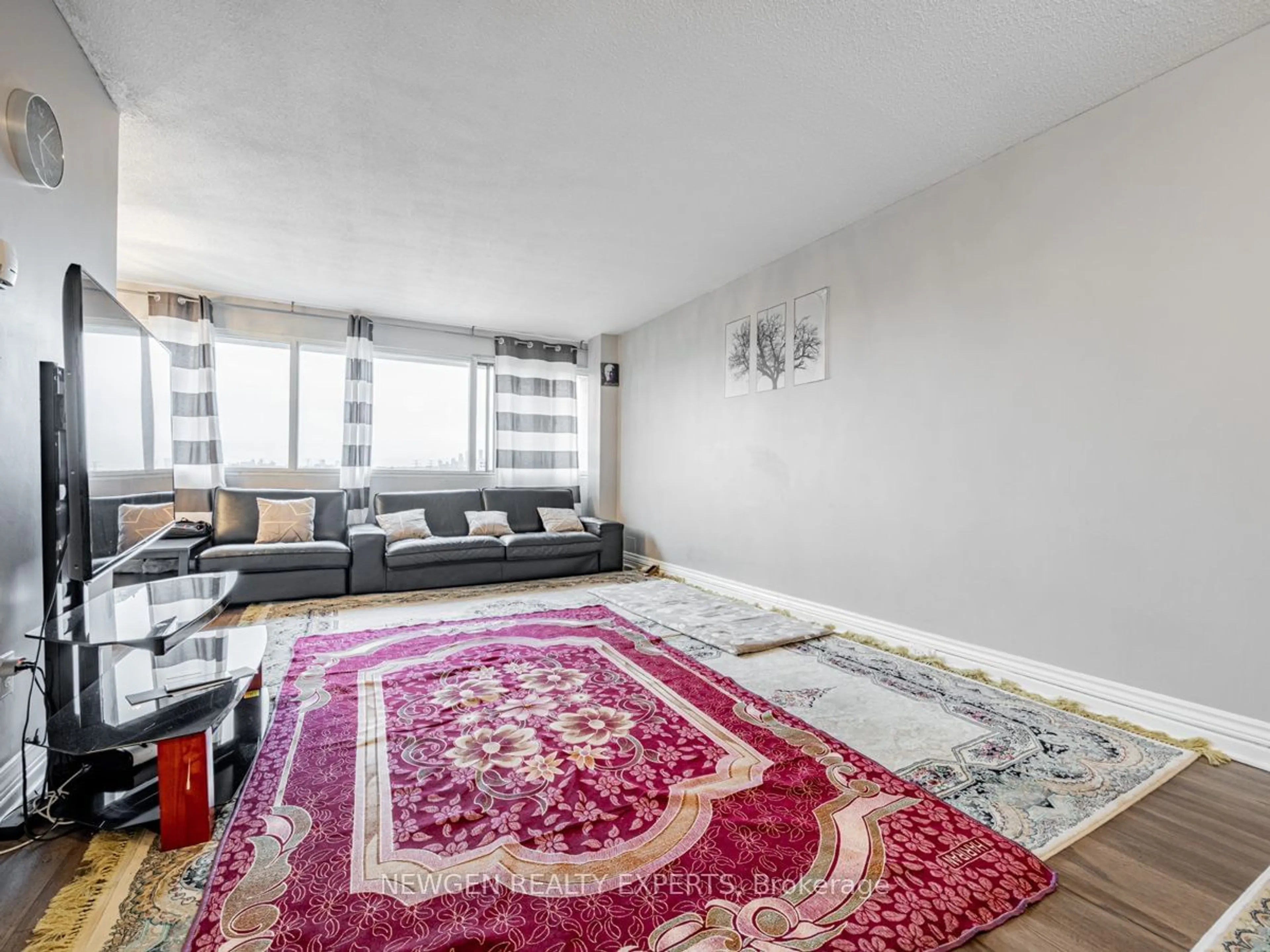 Living room with furniture, carpet floor for 715 Don Mills Rd #802, Toronto Ontario M3C 1S5