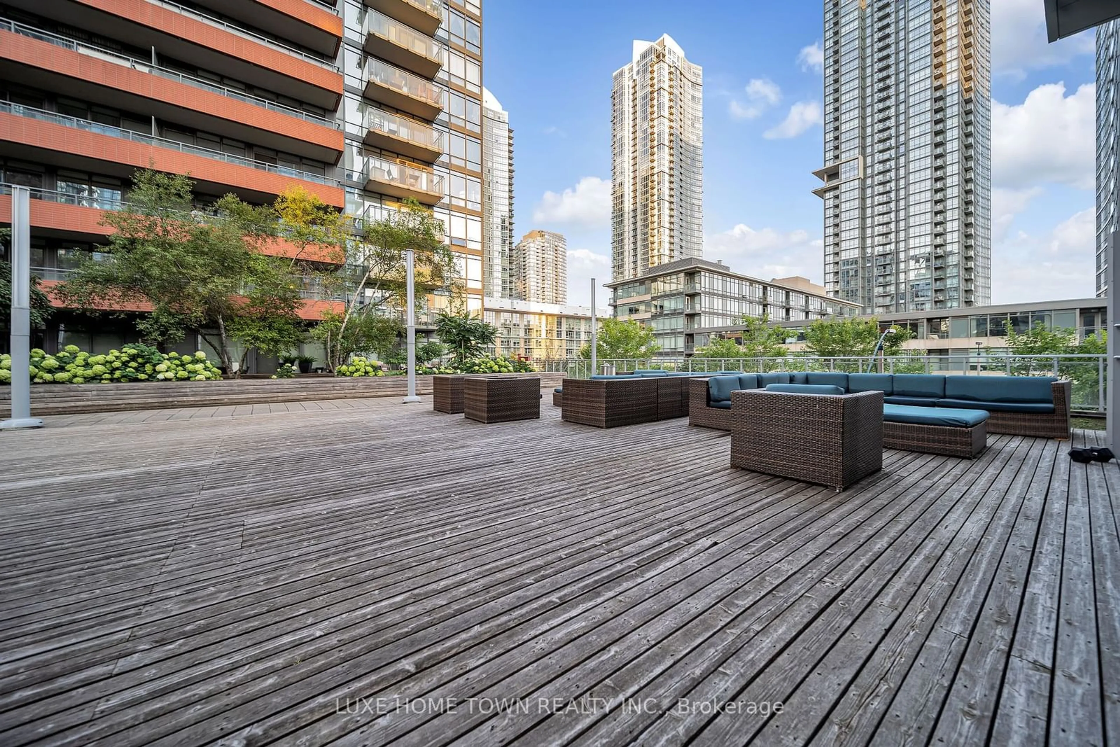 Patio, city buildings view from balcony for 4K Spadina Ave #711, Toronto Ontario M5V 3Y9