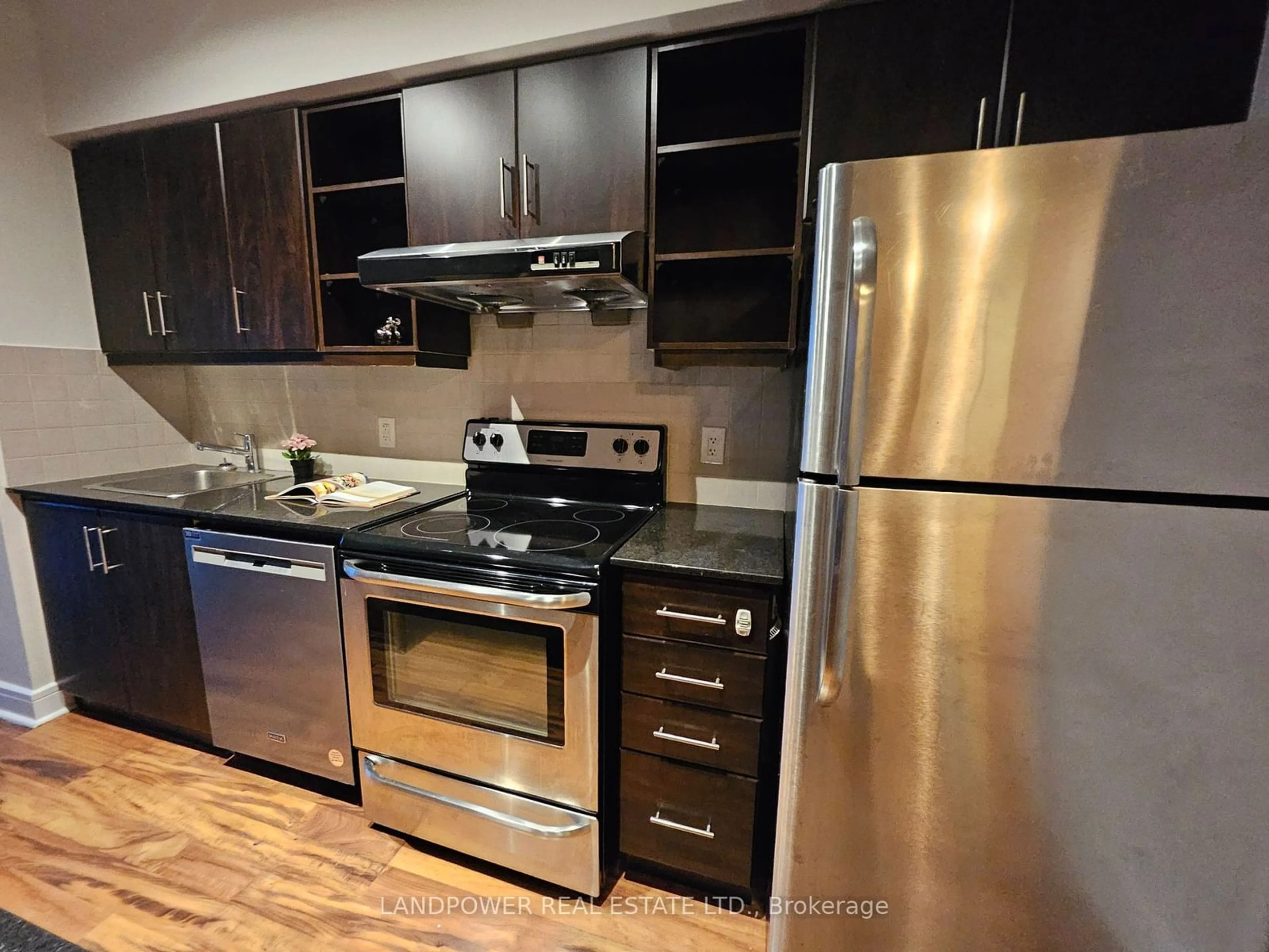 Standard kitchen, wood/laminate floor for 35 Brian Peck Cres #710, Toronto Ontario M4G 0A5