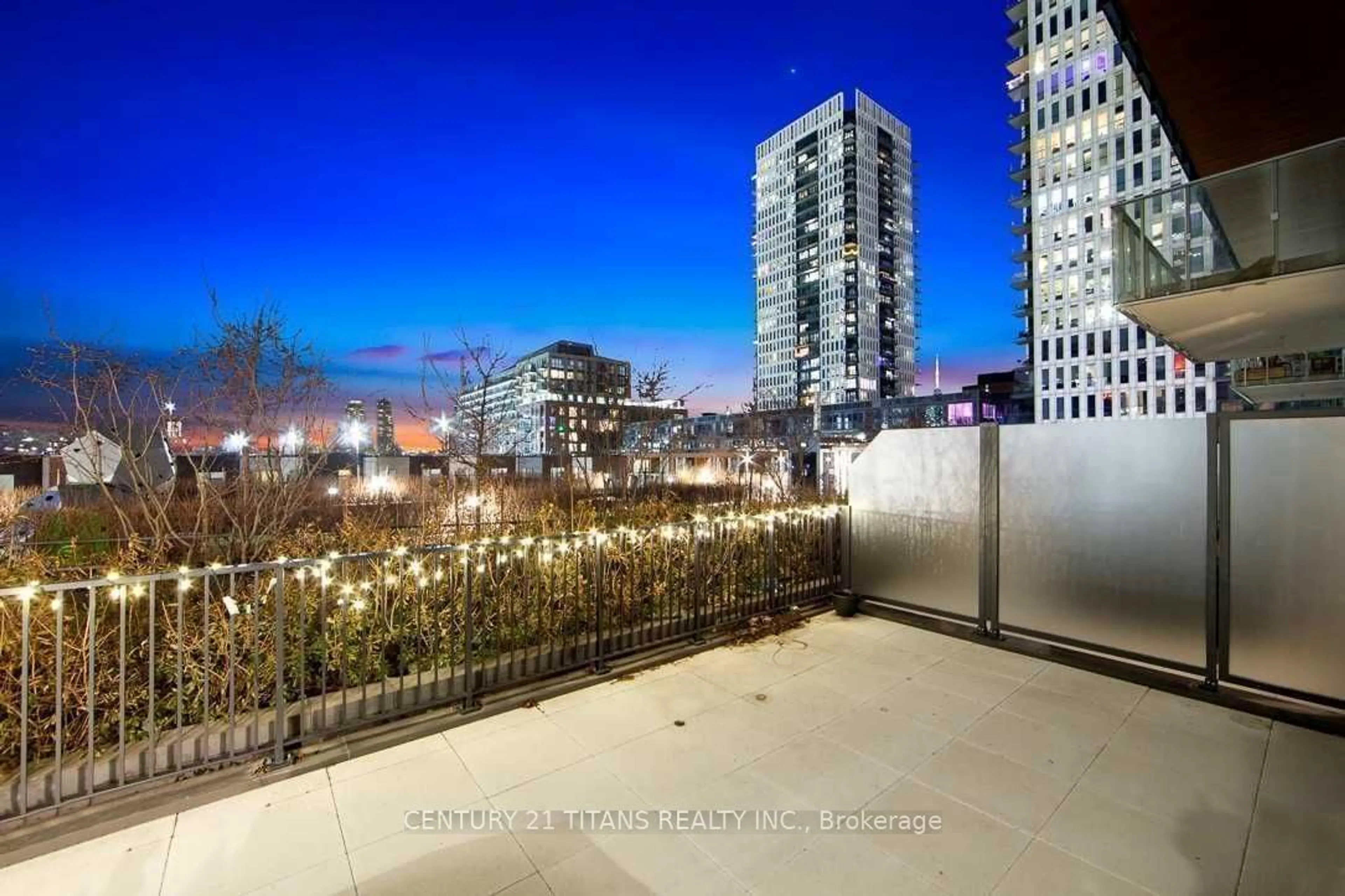 Patio, city buildings view from balcony for 20 Tubman Ave #302, Toronto Ontario M5A 0M5