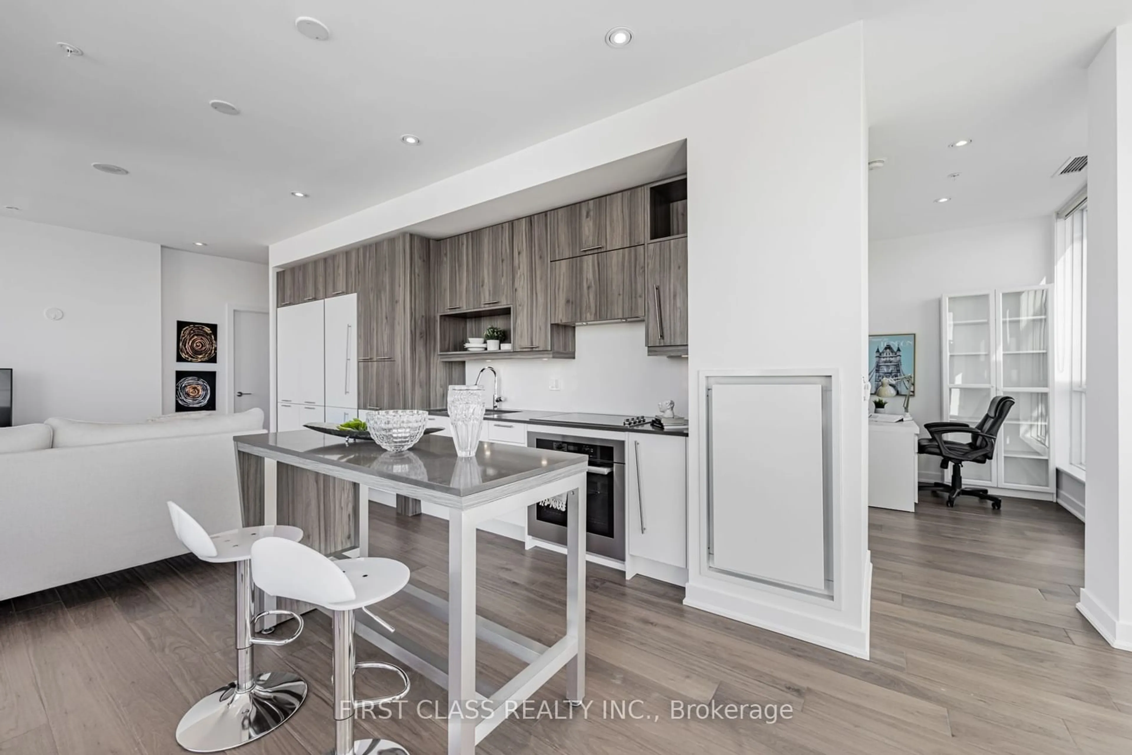 Open concept kitchen, wood/laminate floor for 30 Nelson St #4104, Toronto Ontario M5V 0H5