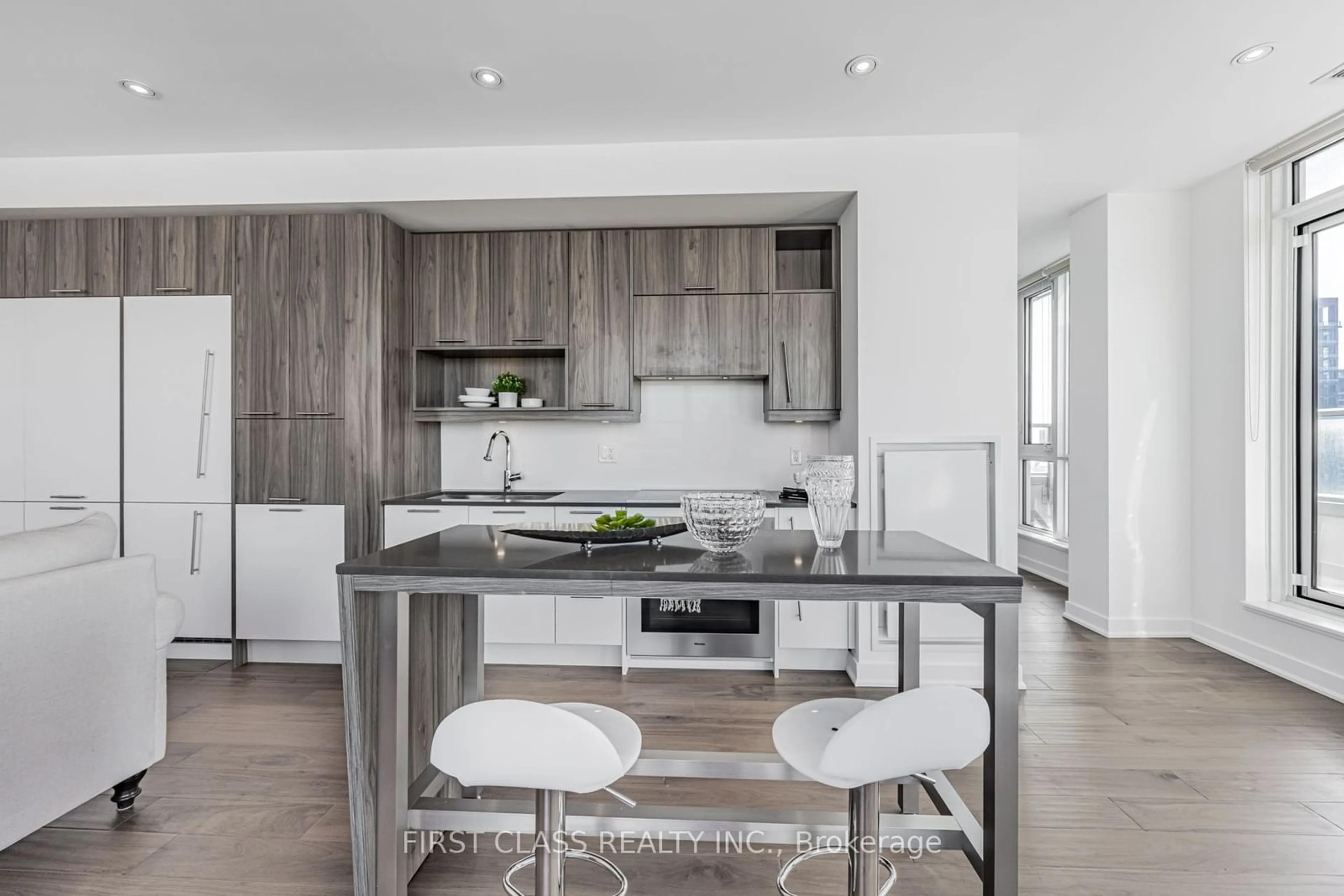 Open concept kitchen, wood/laminate floor for 30 Nelson St #4104, Toronto Ontario M5V 0H5