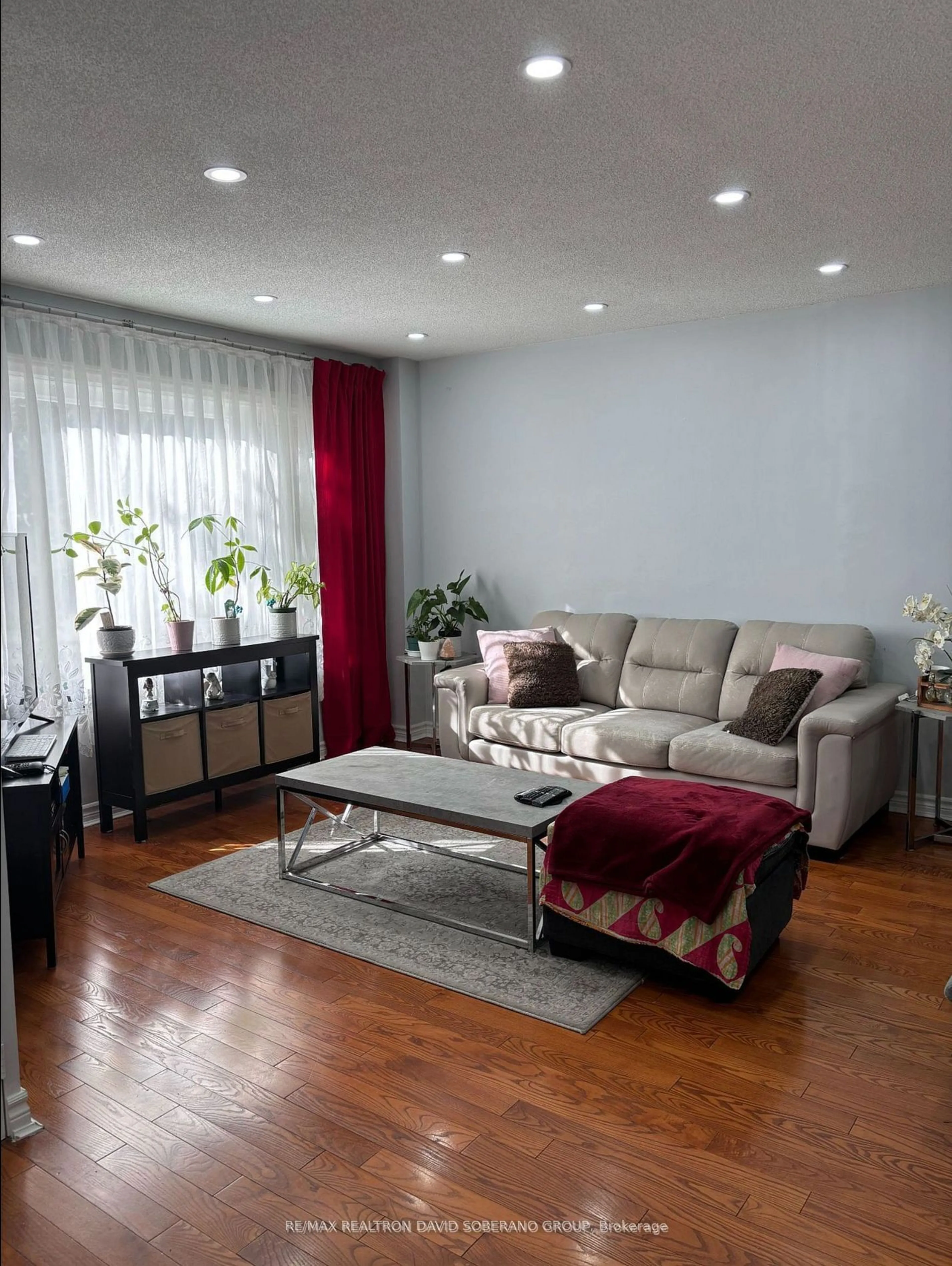 Living room with furniture, wood/laminate floor for 759 Wilson Heights Blvd, Toronto Ontario M3H 2W1