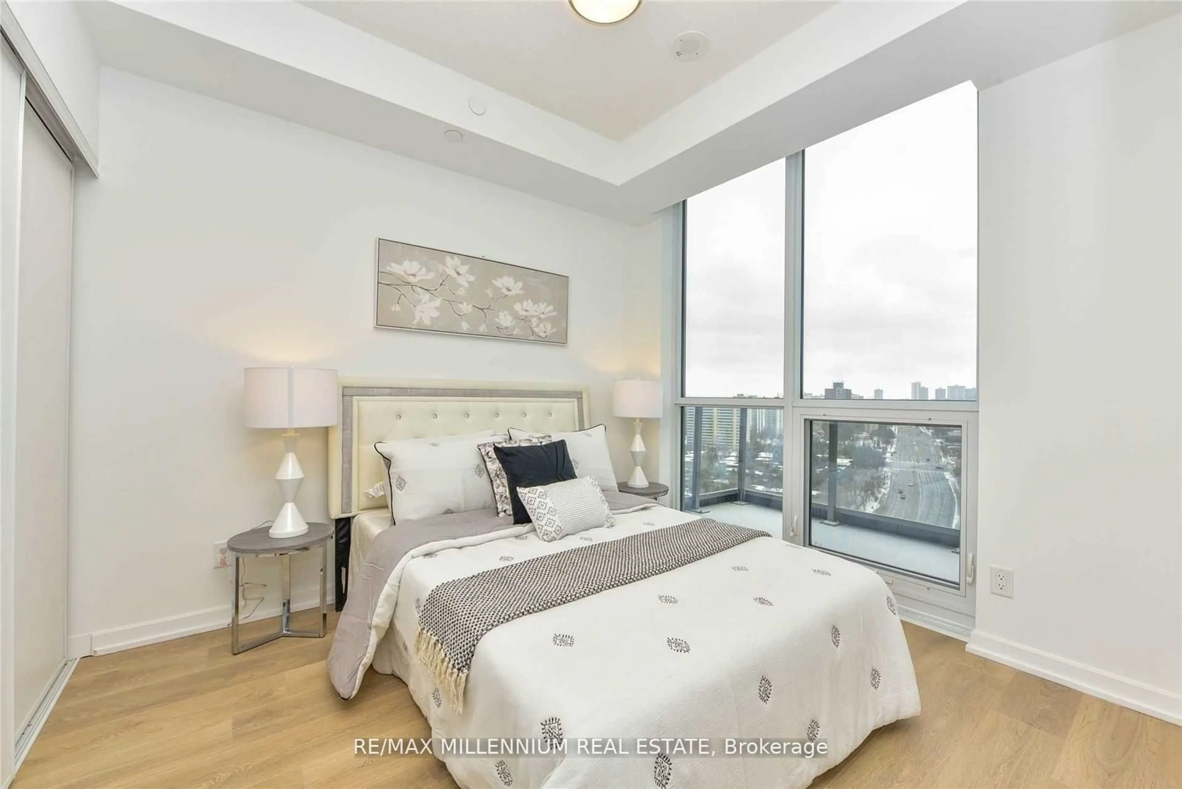 Bedroom with bed, wood/laminate floor for 36 Forest Manr #1309, Toronto Ontario M2J 1M5