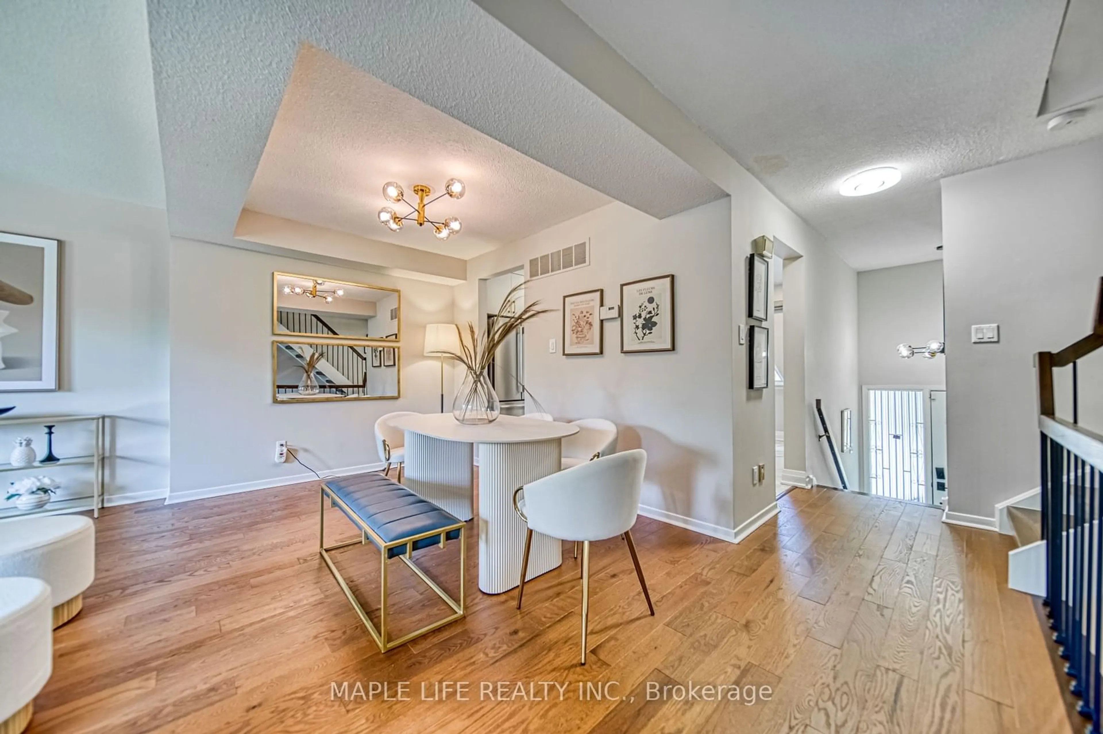 Dining room, wood/laminate floor for 83 Flaming Rose Way, Toronto Ontario M2N 5W8