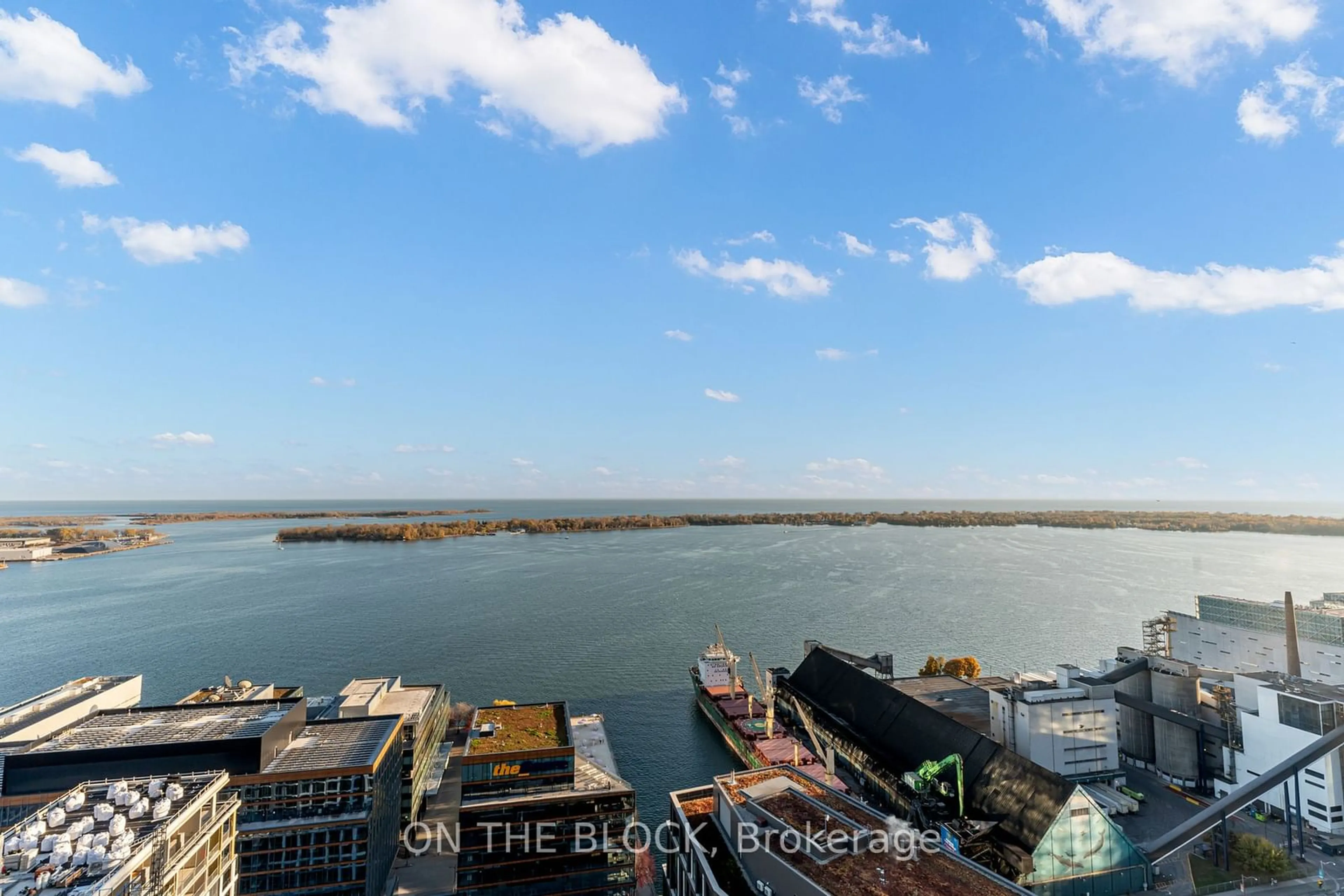 A pic from outside/outdoor area/front of a property/back of a property/a pic from drone, water/lake/river/ocean view for 20 Richardson St #3204, Toronto Ontario M5A 0S6