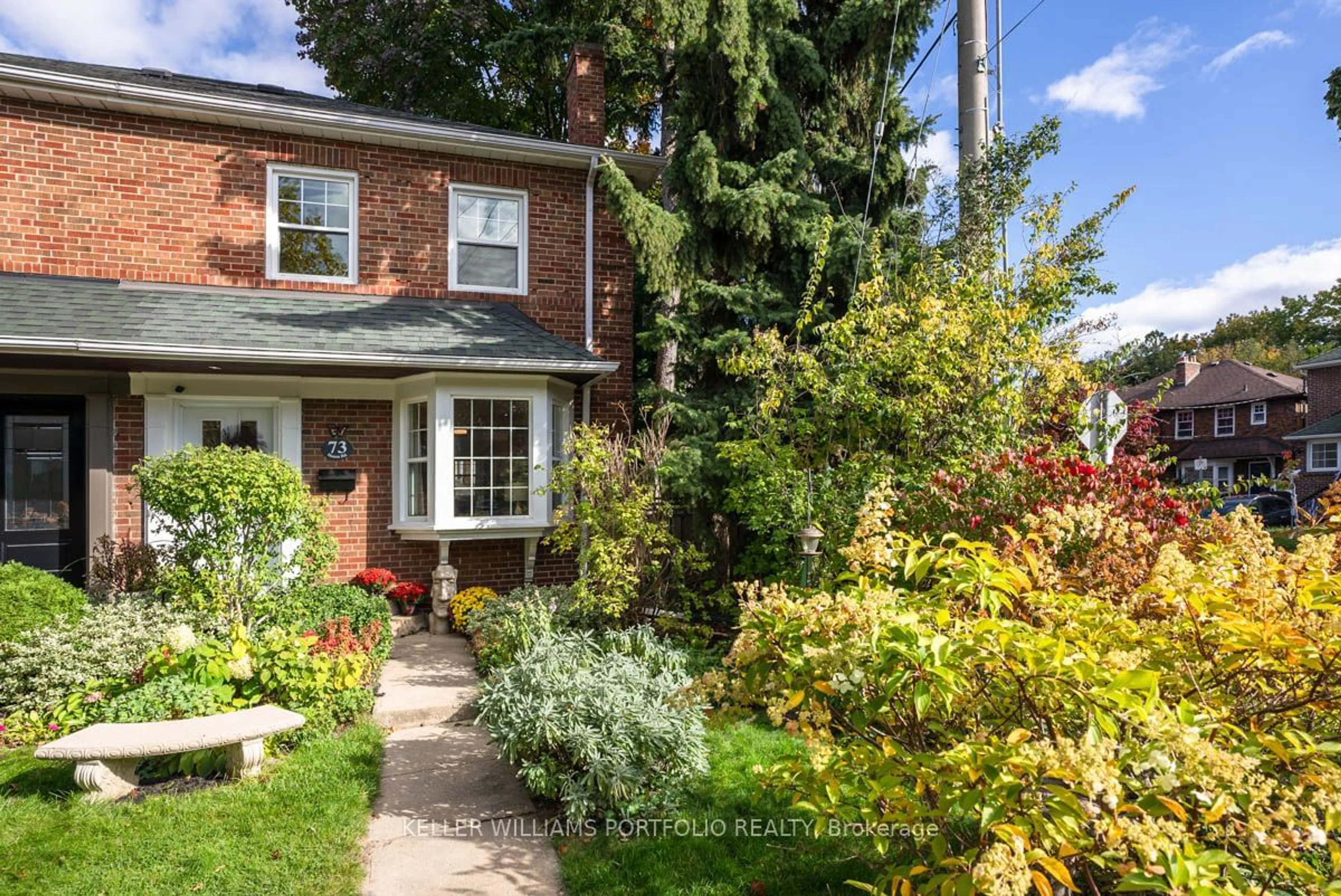 Home with brick exterior material, street for 73 Hanna Rd, Toronto Ontario M4G 3N2