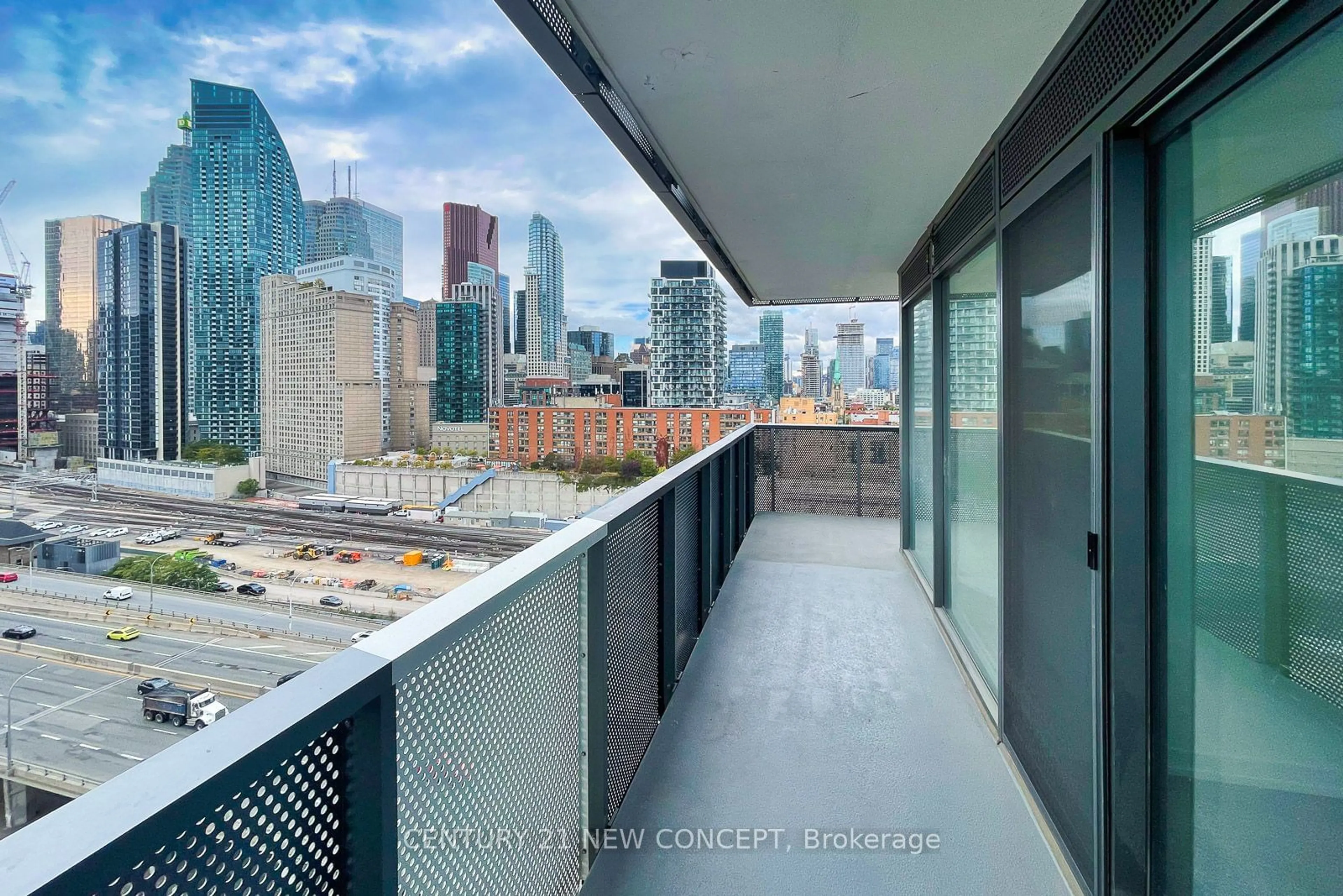 Balcony in the apartment, city buildings view from balcony for 55 Cooper St #1601, Toronto Ontario M5E 0G1