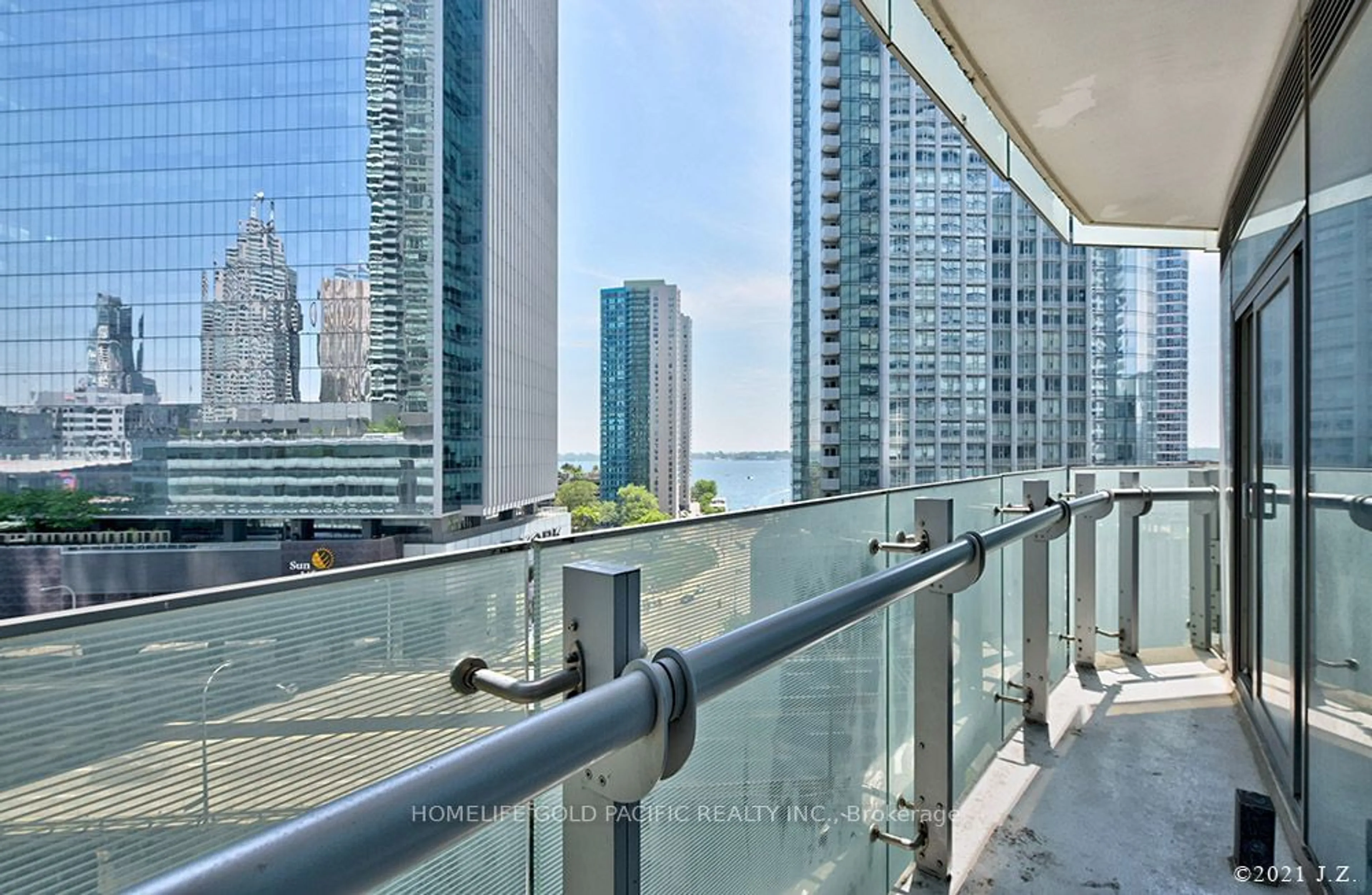 Balcony in the apartment, city buildings view from balcony for 12 York St #3108, Toronto Ontario M5J 0A9