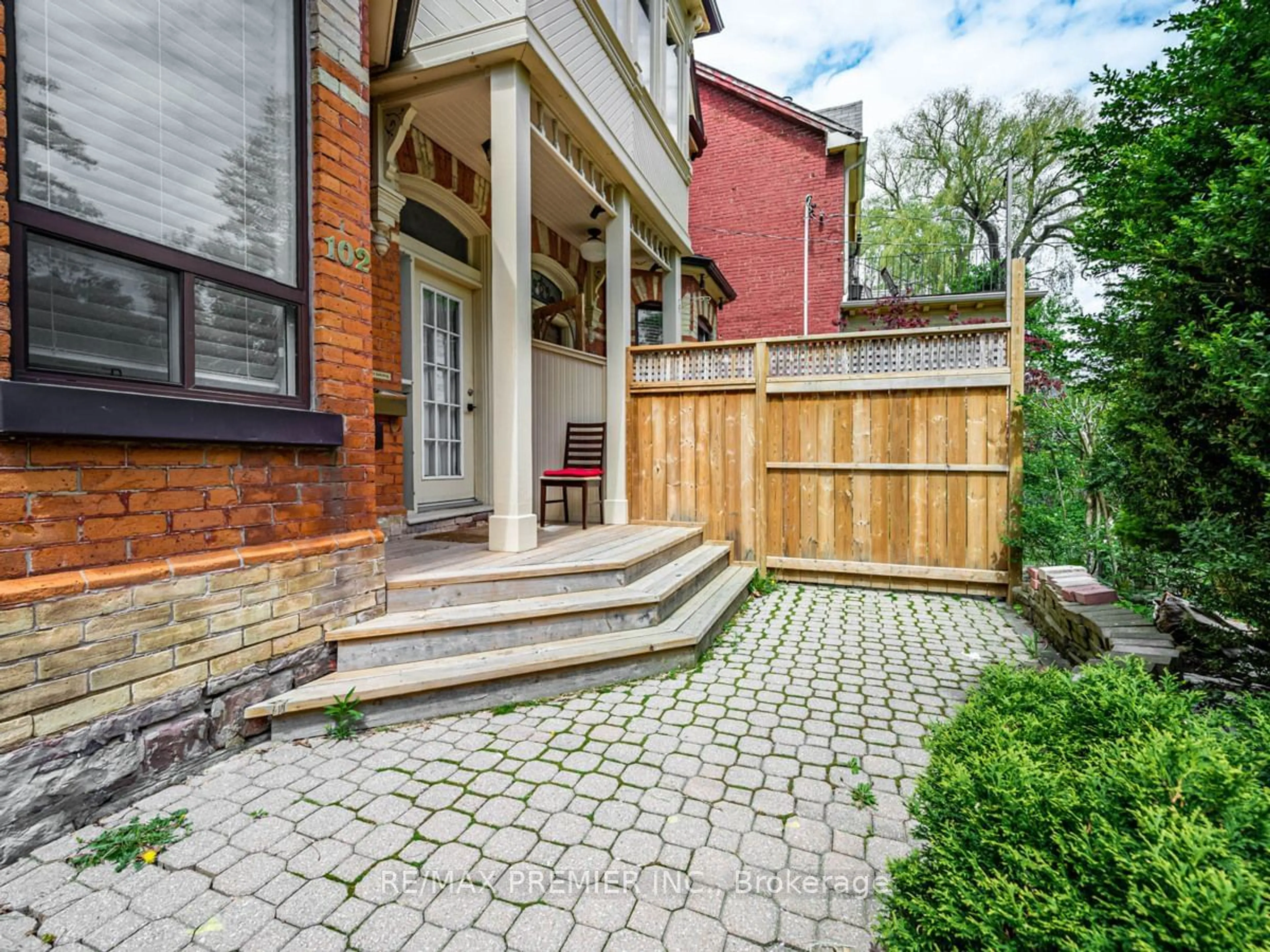 Home with brick exterior material, street for 102 Bellevue Ave, Toronto Ontario M5T 2N9