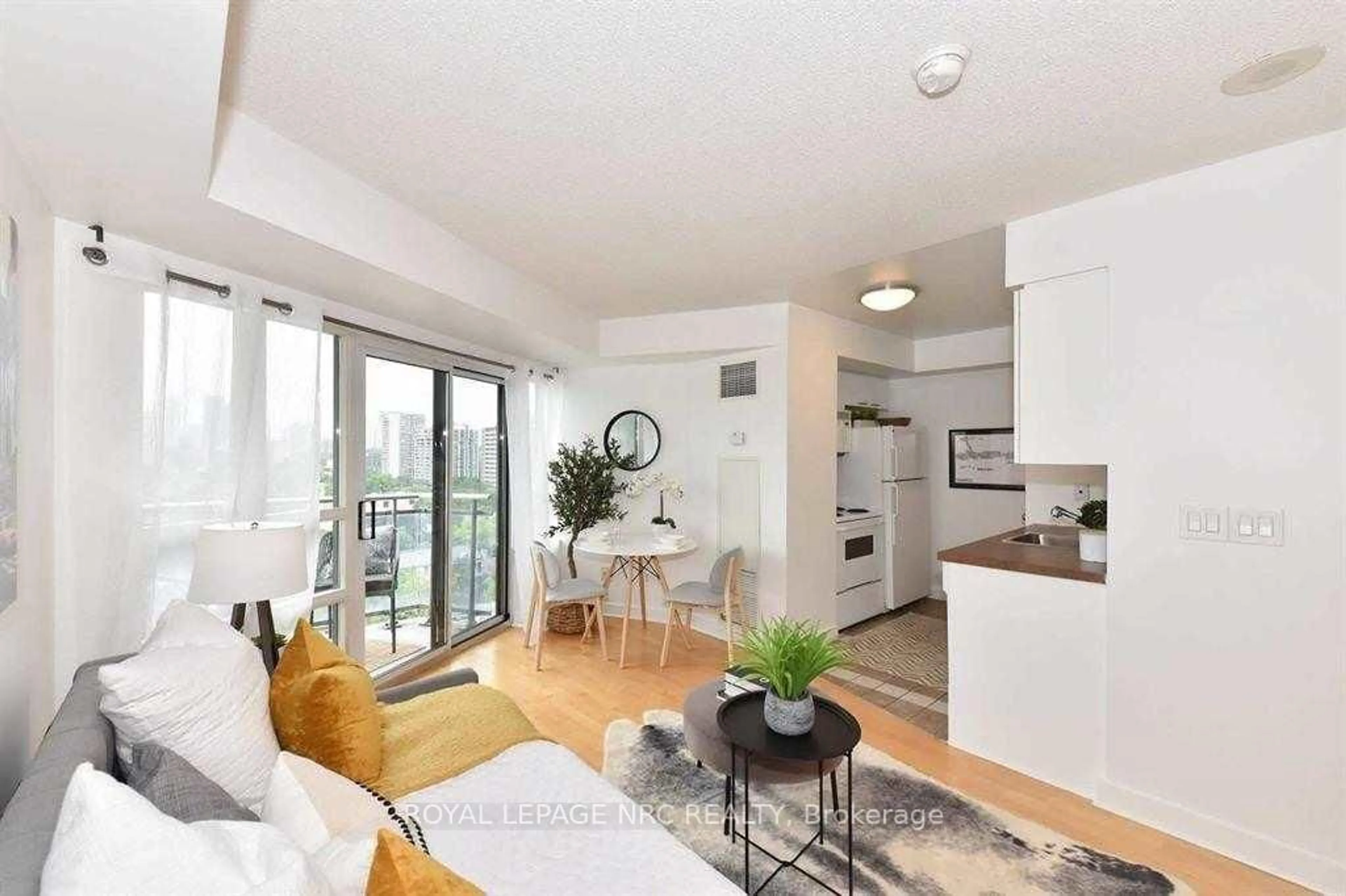 Living room with furniture, wood/laminate floor for 255 Richmond St #1211, Toronto Ontario M5A 4T7