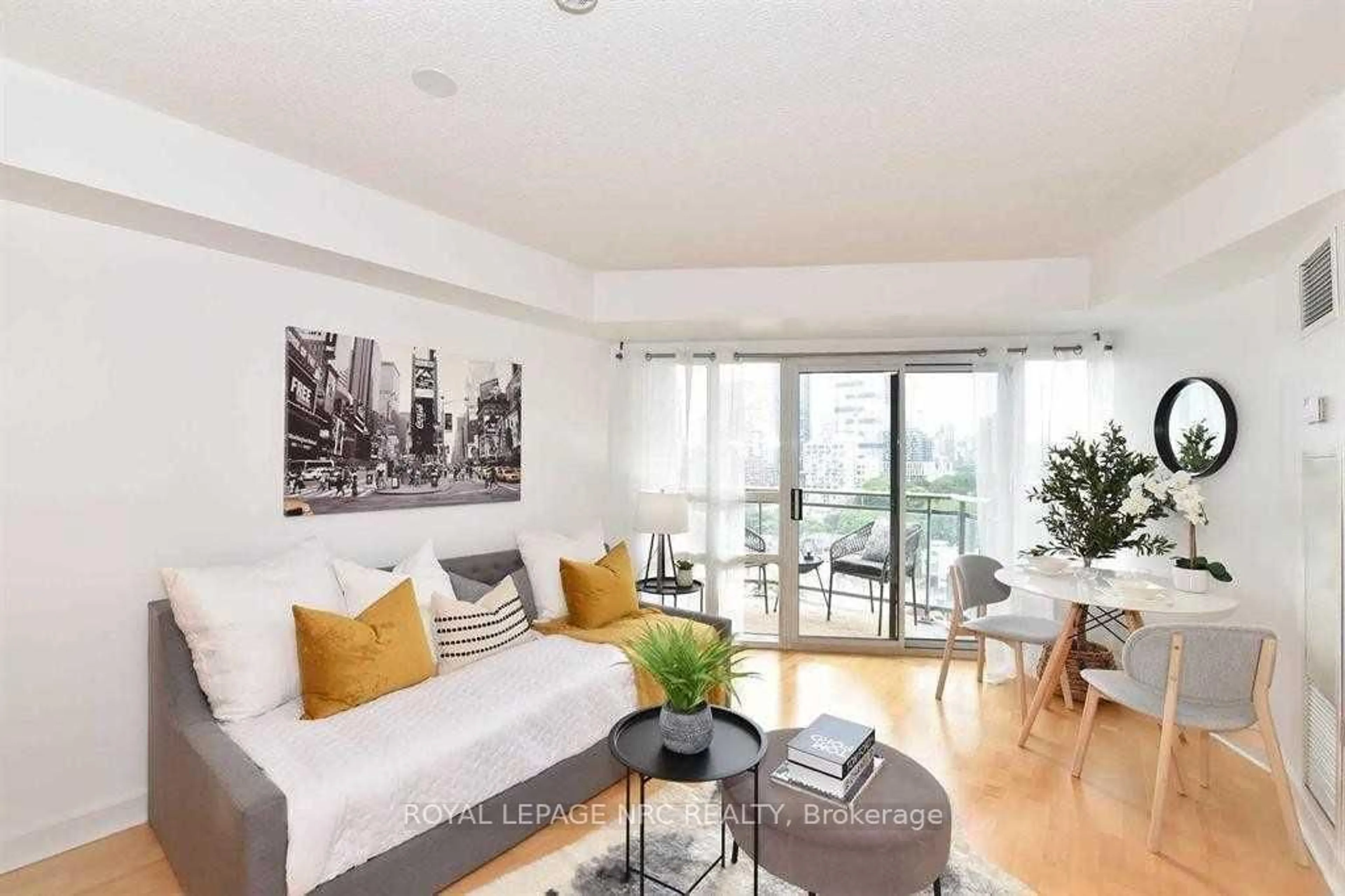 Living room with furniture, wood/laminate floor for 255 Richmond St #1211, Toronto Ontario M5A 4T7