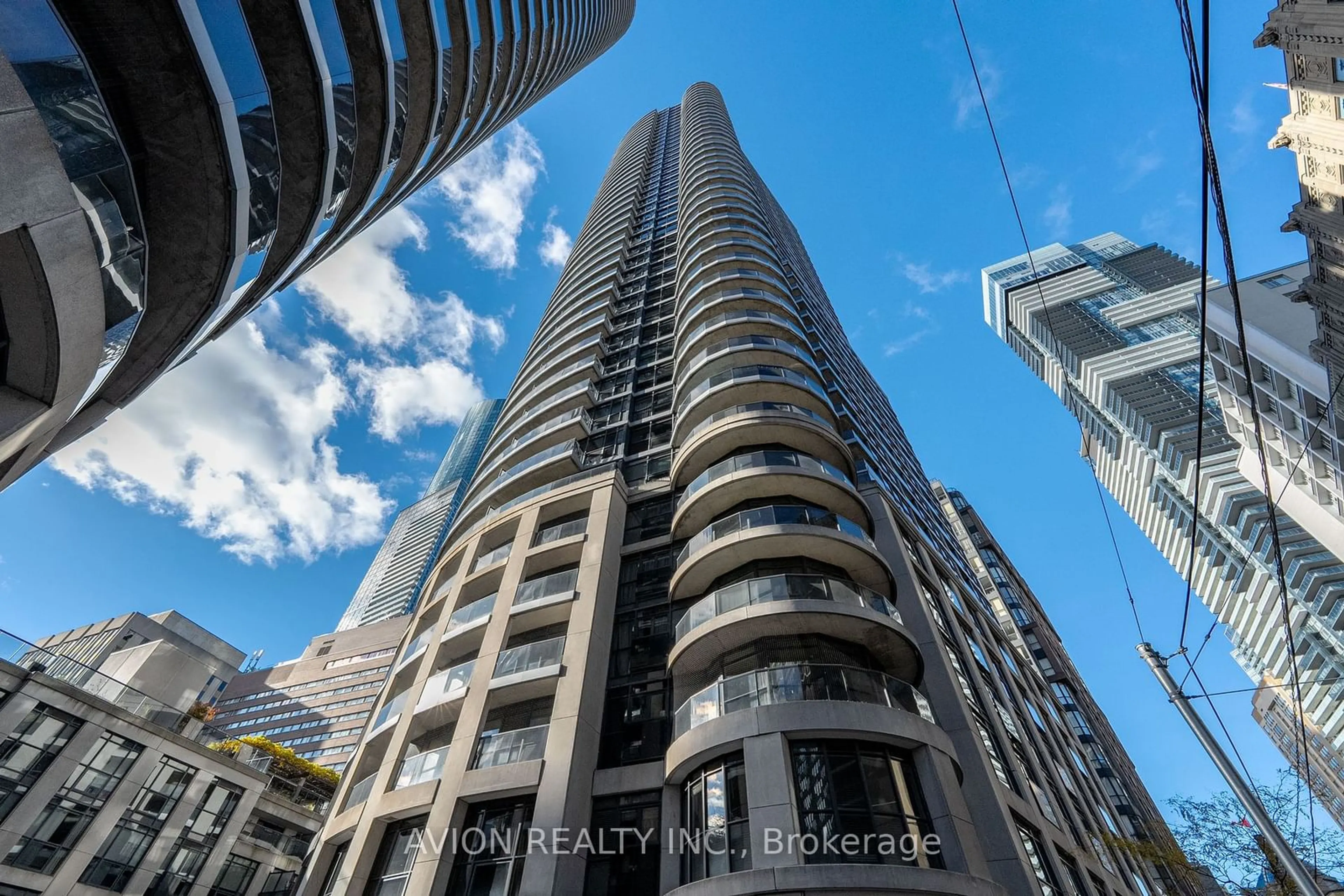 A pic from outside/outdoor area/front of a property/back of a property/a pic from drone, city buildings view from balcony for 21 Carlton St #2909, Toronto Ontario M5B 1L3