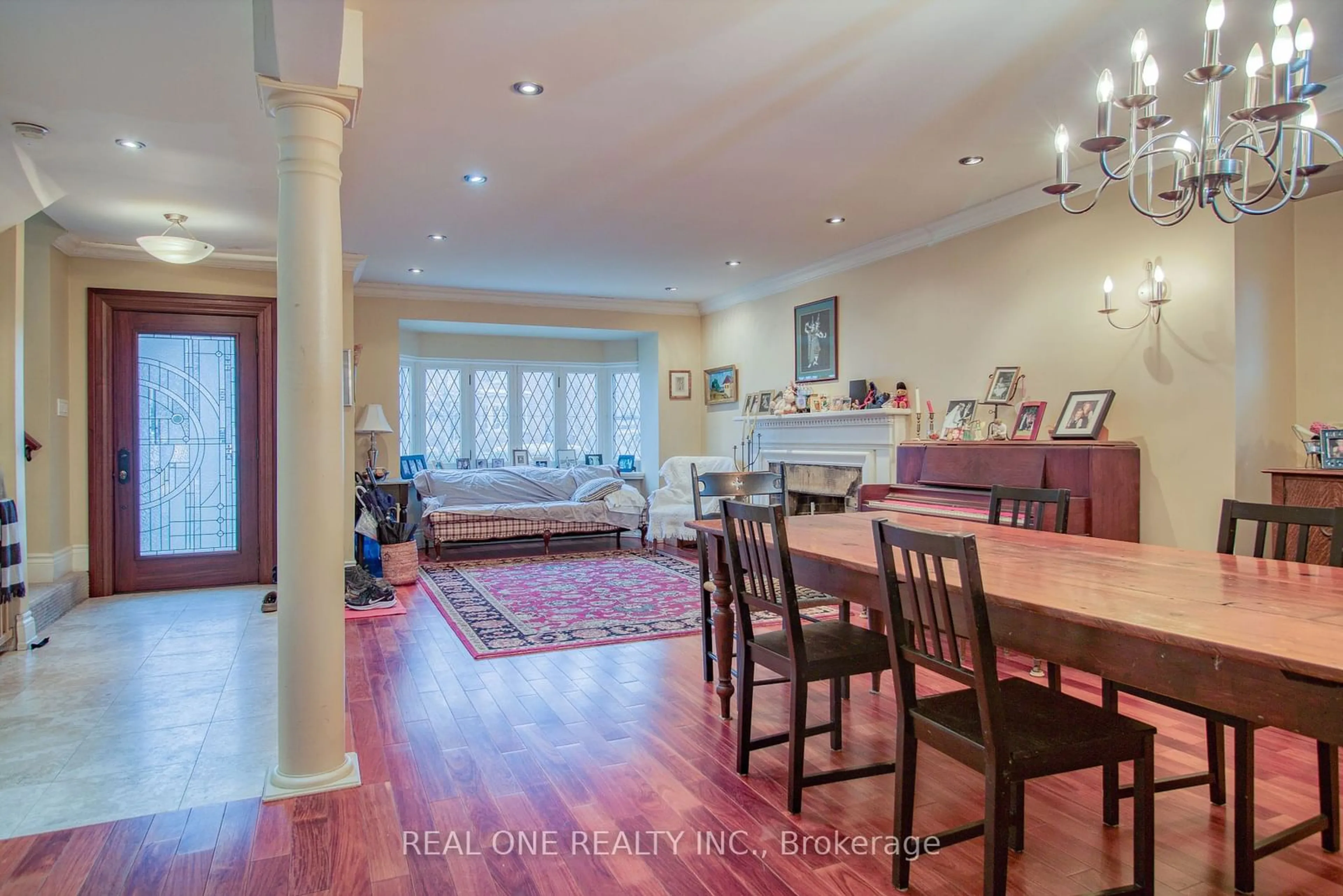 Dining room, wood/laminate floor for 129 Imperial St, Toronto Ontario M5P 1C7