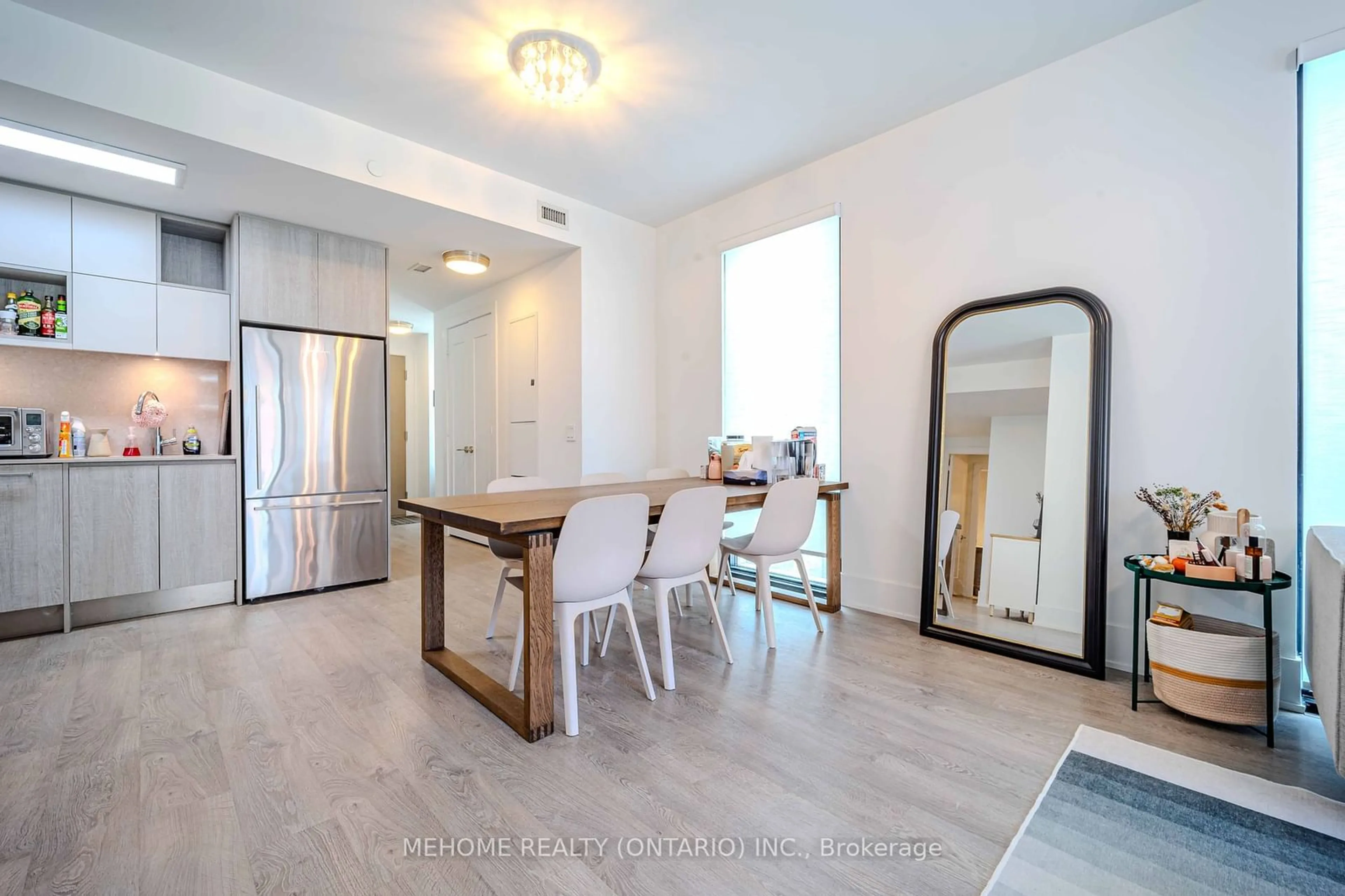 Dining room, wood/laminate floor for 118 Merchants' Wharf Ave #322, Toronto Ontario M5A 0L3