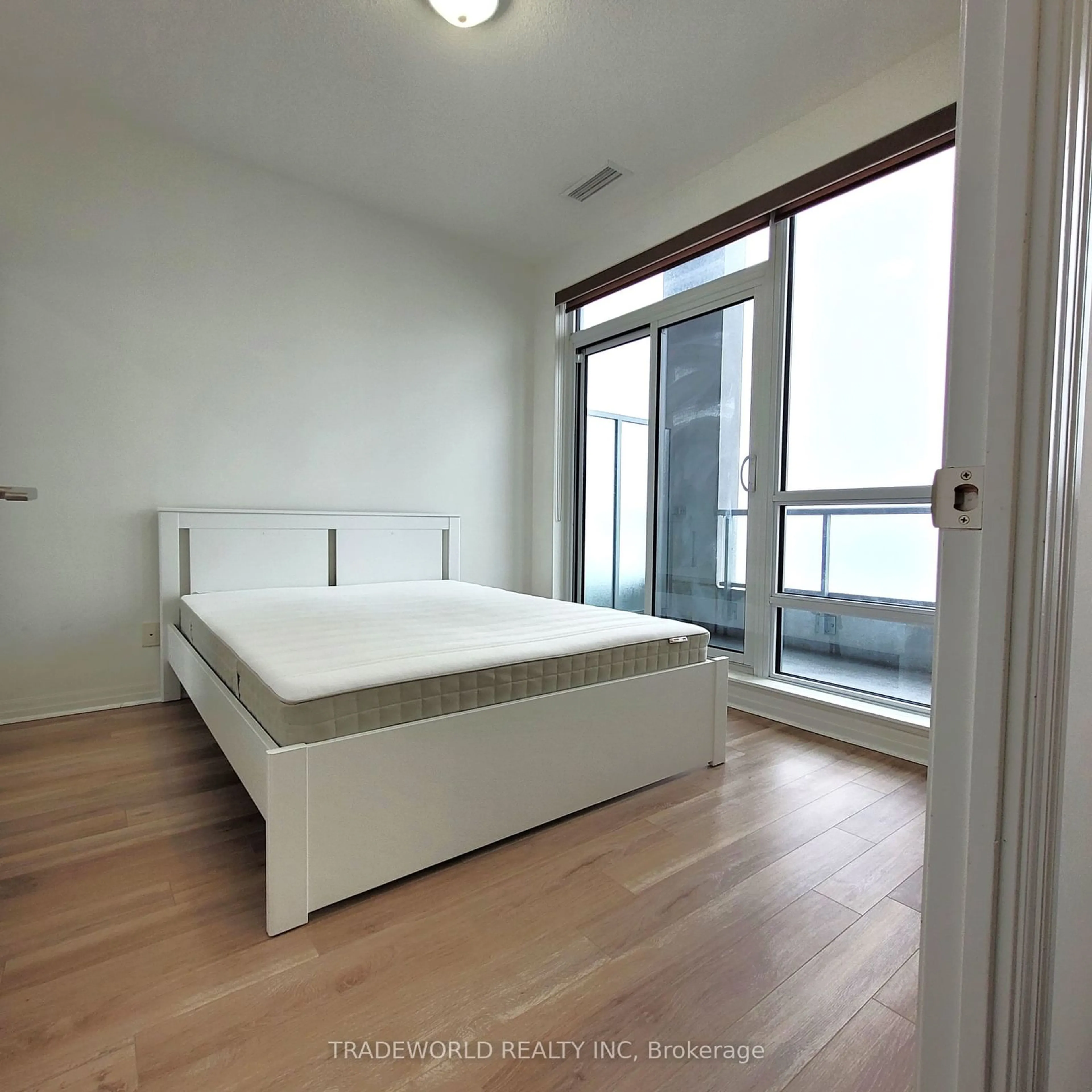 Bedroom with bed, wood/laminate floor for 2015 Sheppard Ave #Ph7, Toronto Ontario M2J 0B3