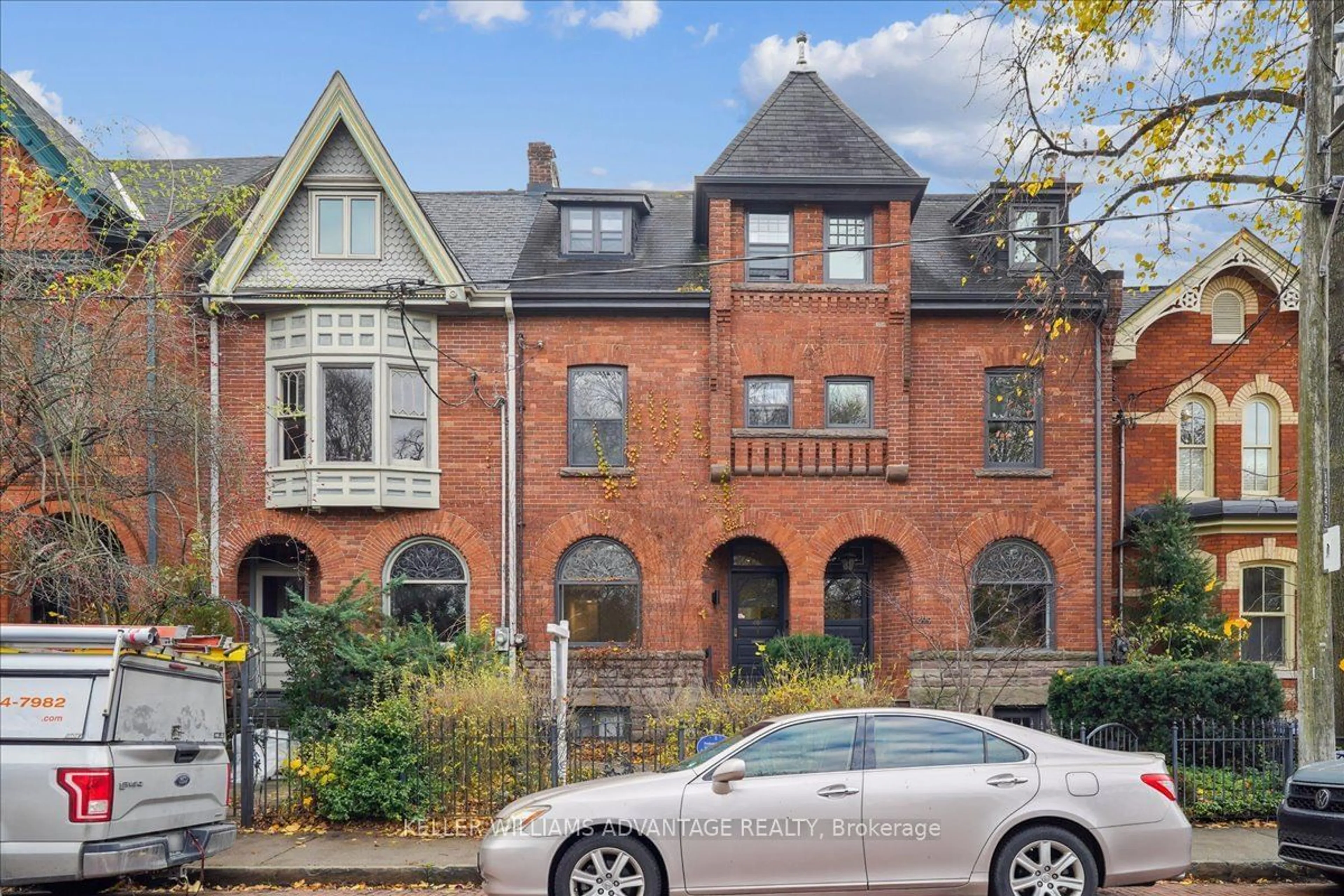 Home with brick exterior material, street for 401 Carlton St, Toronto Ontario M5A 2M3