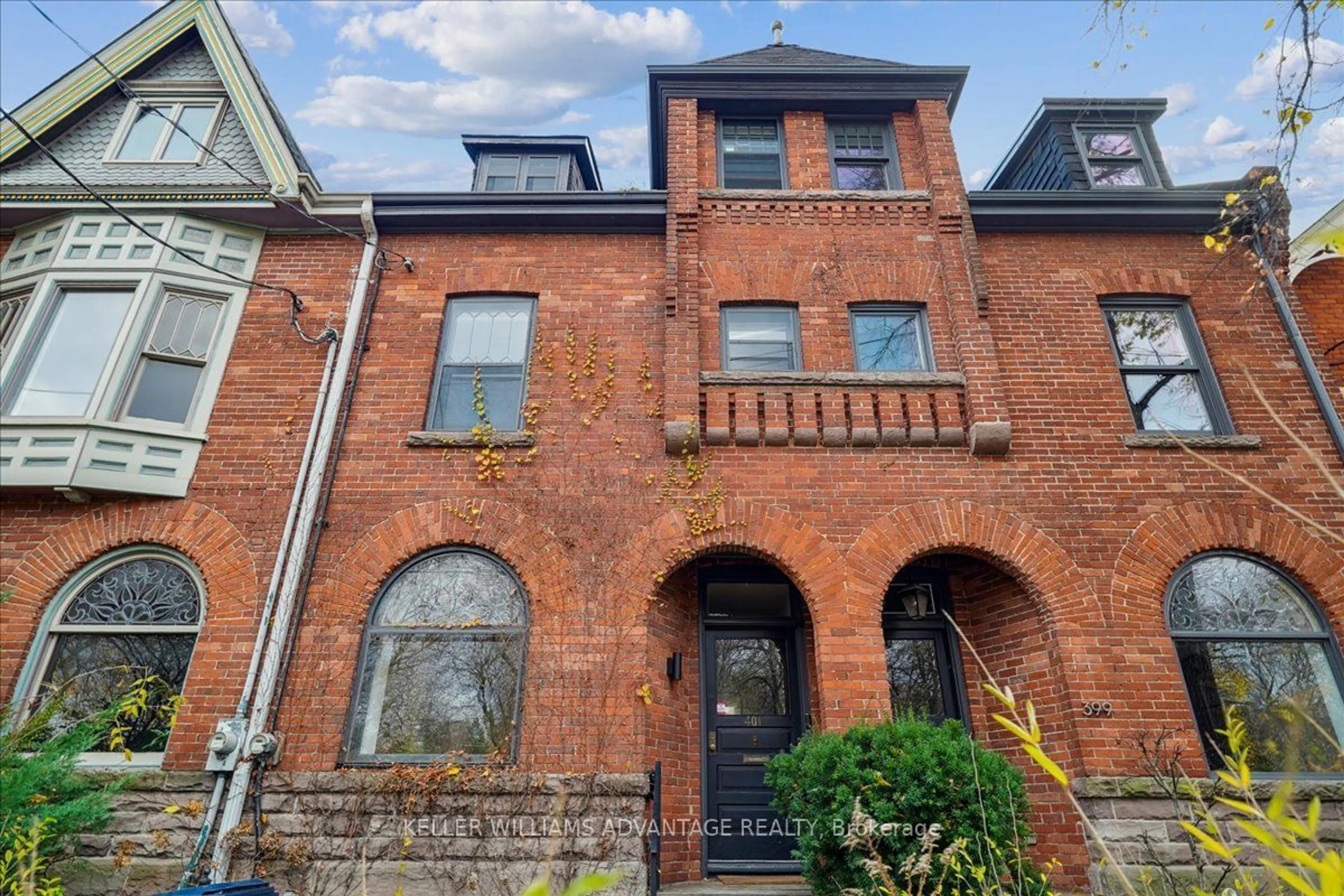 Home with brick exterior material, street for 401 Carlton St, Toronto Ontario M5A 2M3