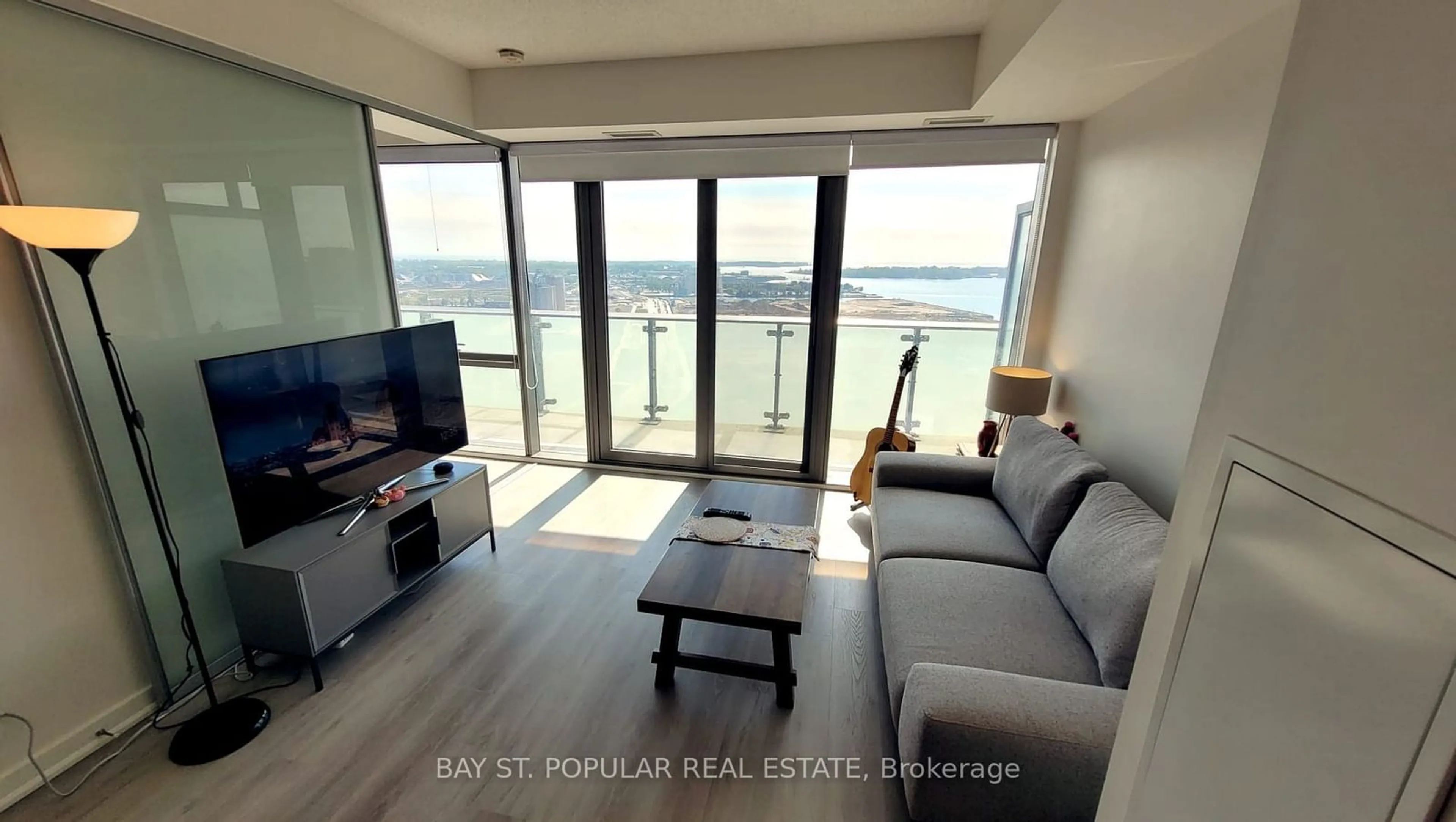 Living room with furniture, wood/laminate floor for 70 Distillery Lane #1807, Toronto Ontario M5A 0E3