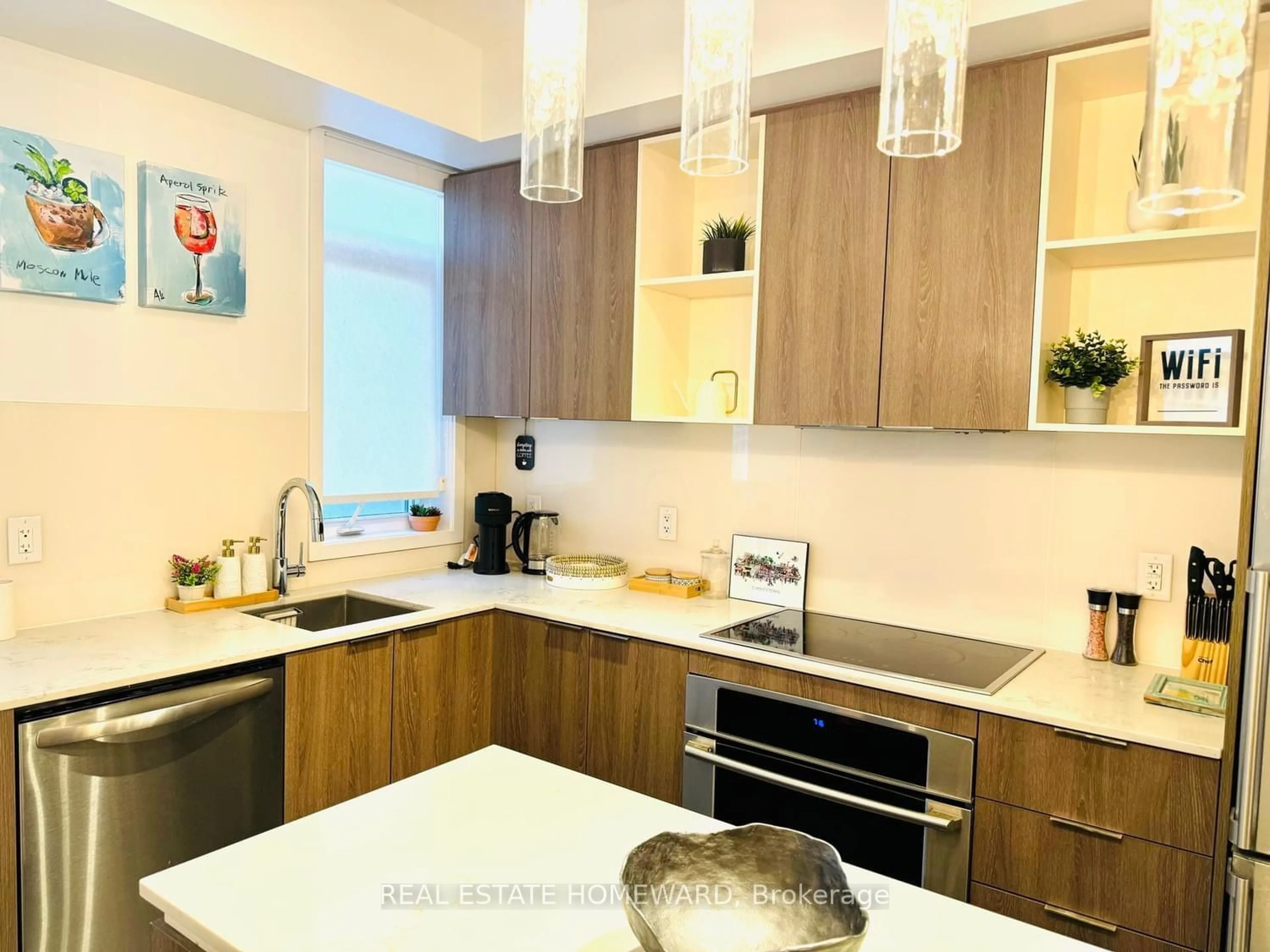 Contemporary kitchen, wood/laminate floor for 17 St. Bartholomew St, Toronto Ontario M5A 0A3