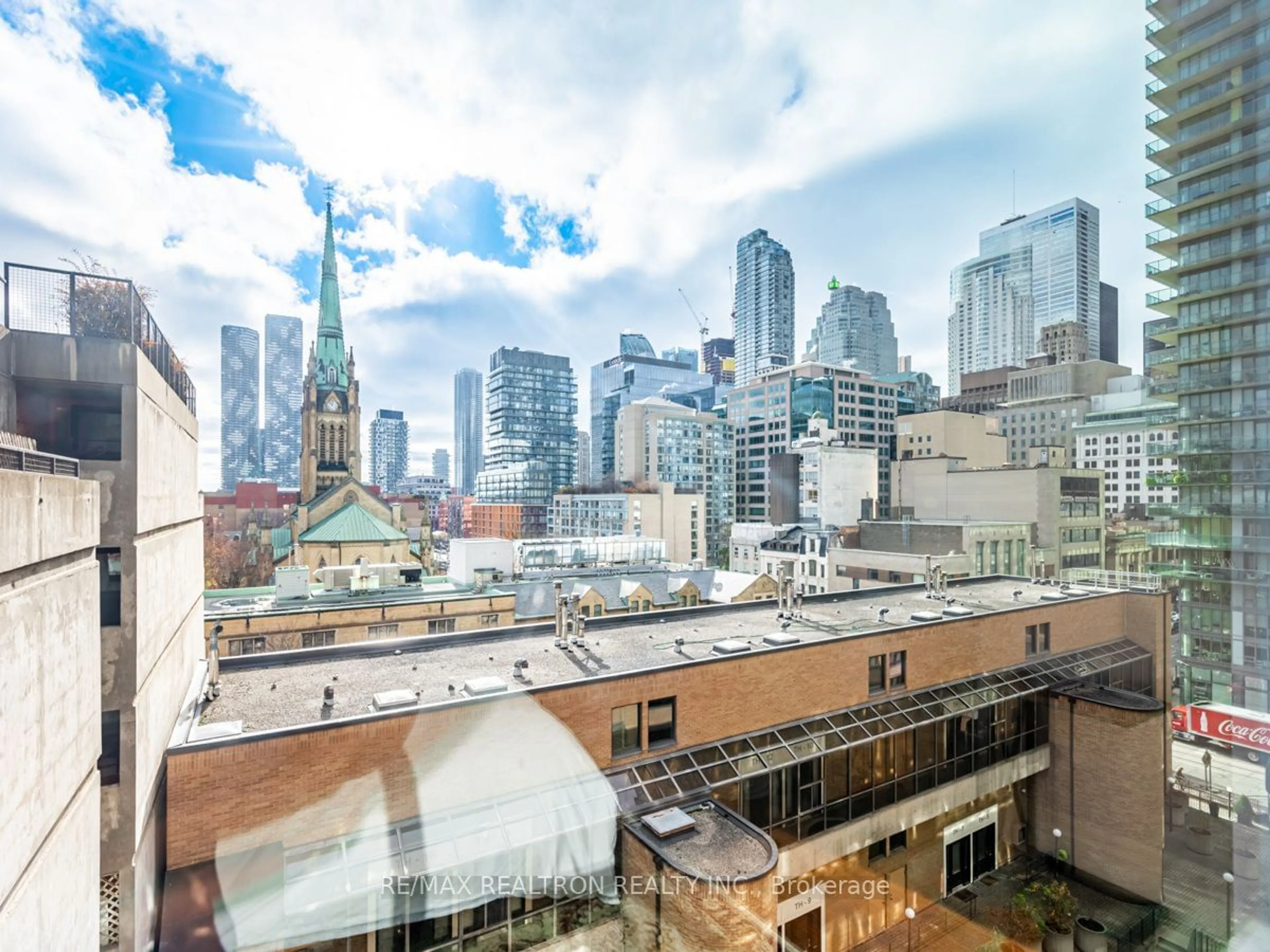 Patio, city buildings view from balcony for 55 Lombard St #613, Toronto Ontario M5C 2R7