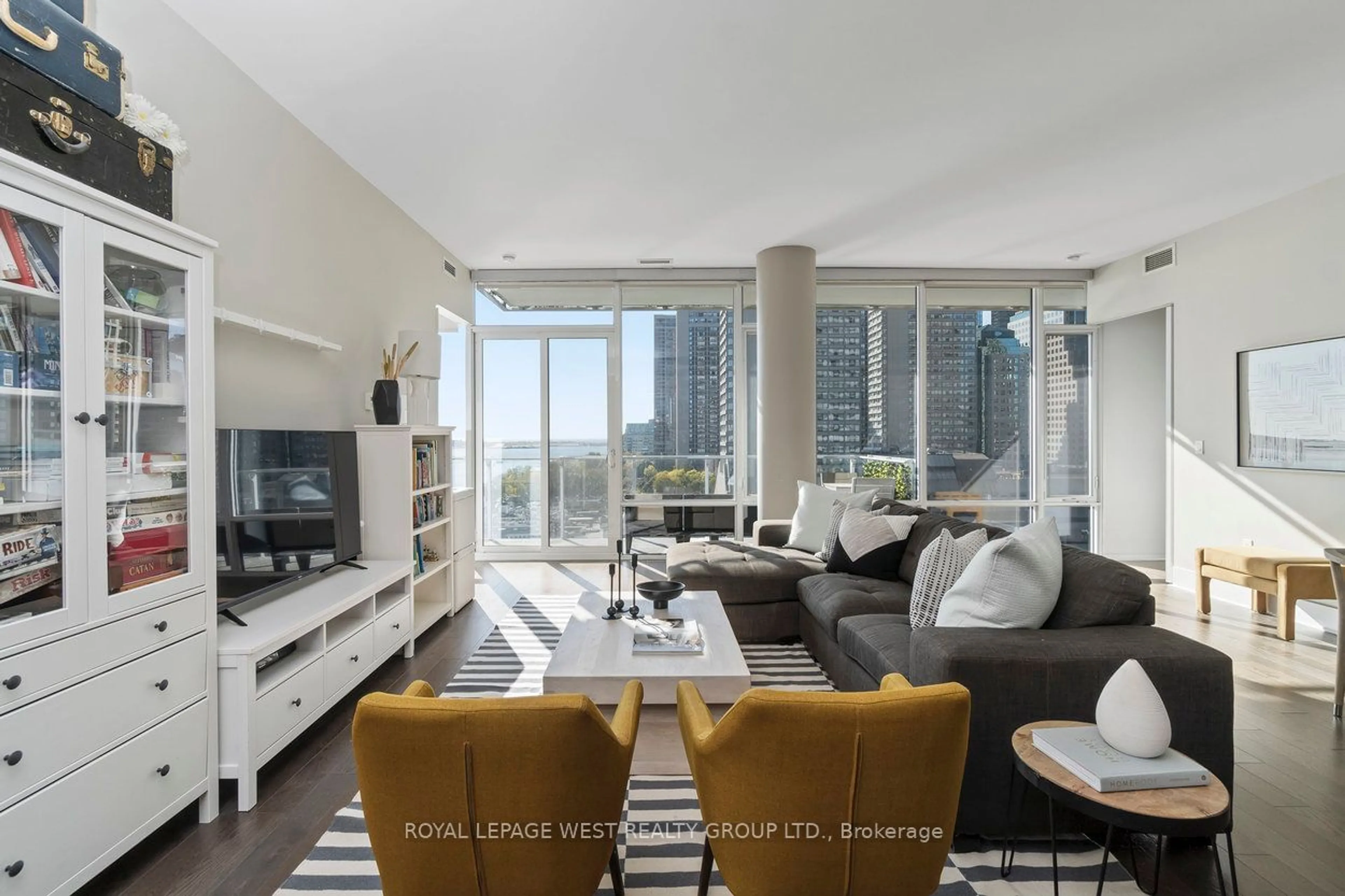 Living room with furniture, unknown for 29 Queens Quay #904, Toronto Ontario M5E 0A4