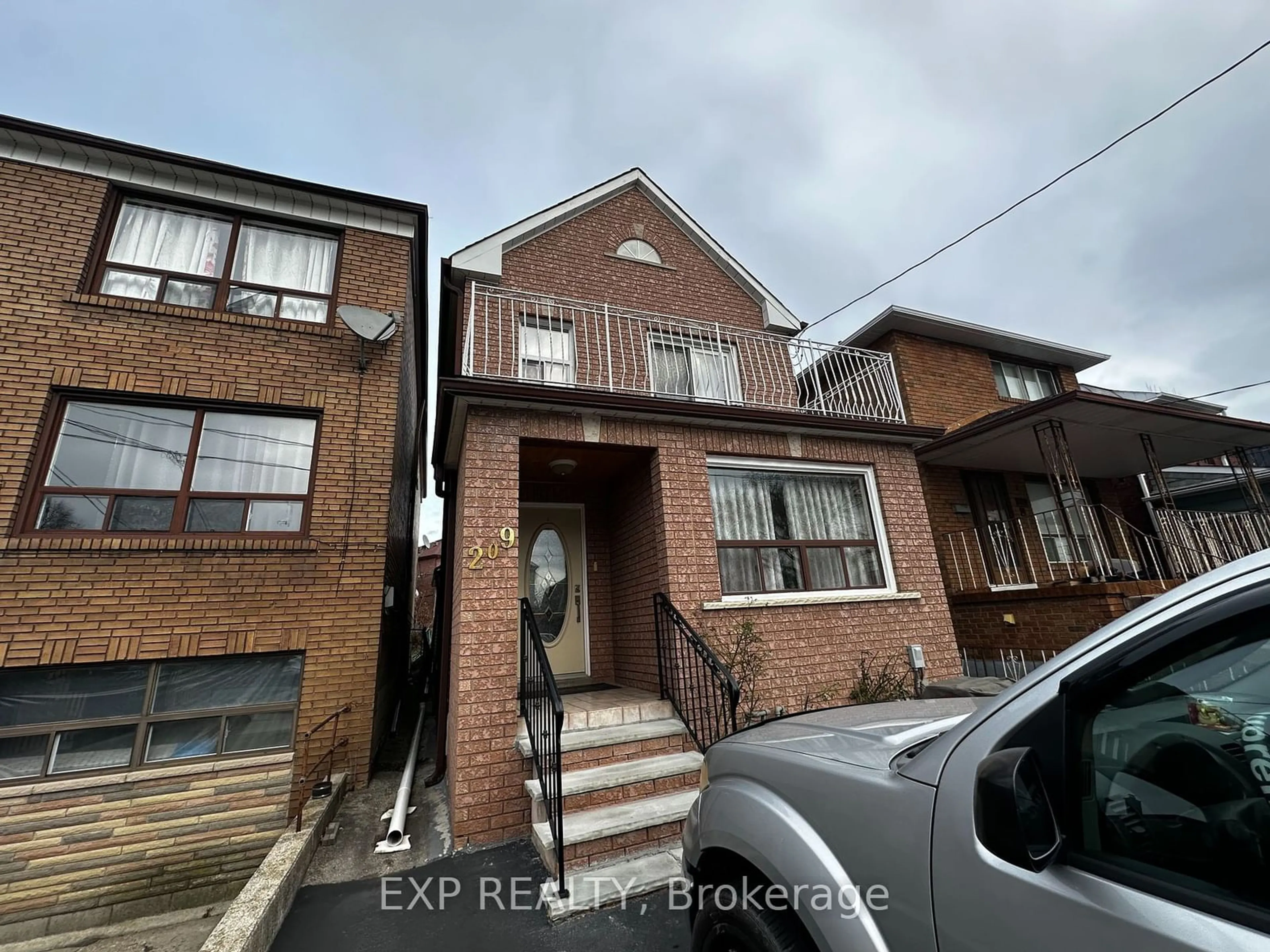 Home with brick exterior material, street for 209 Cedric Ave, Toronto Ontario M6C 3X9