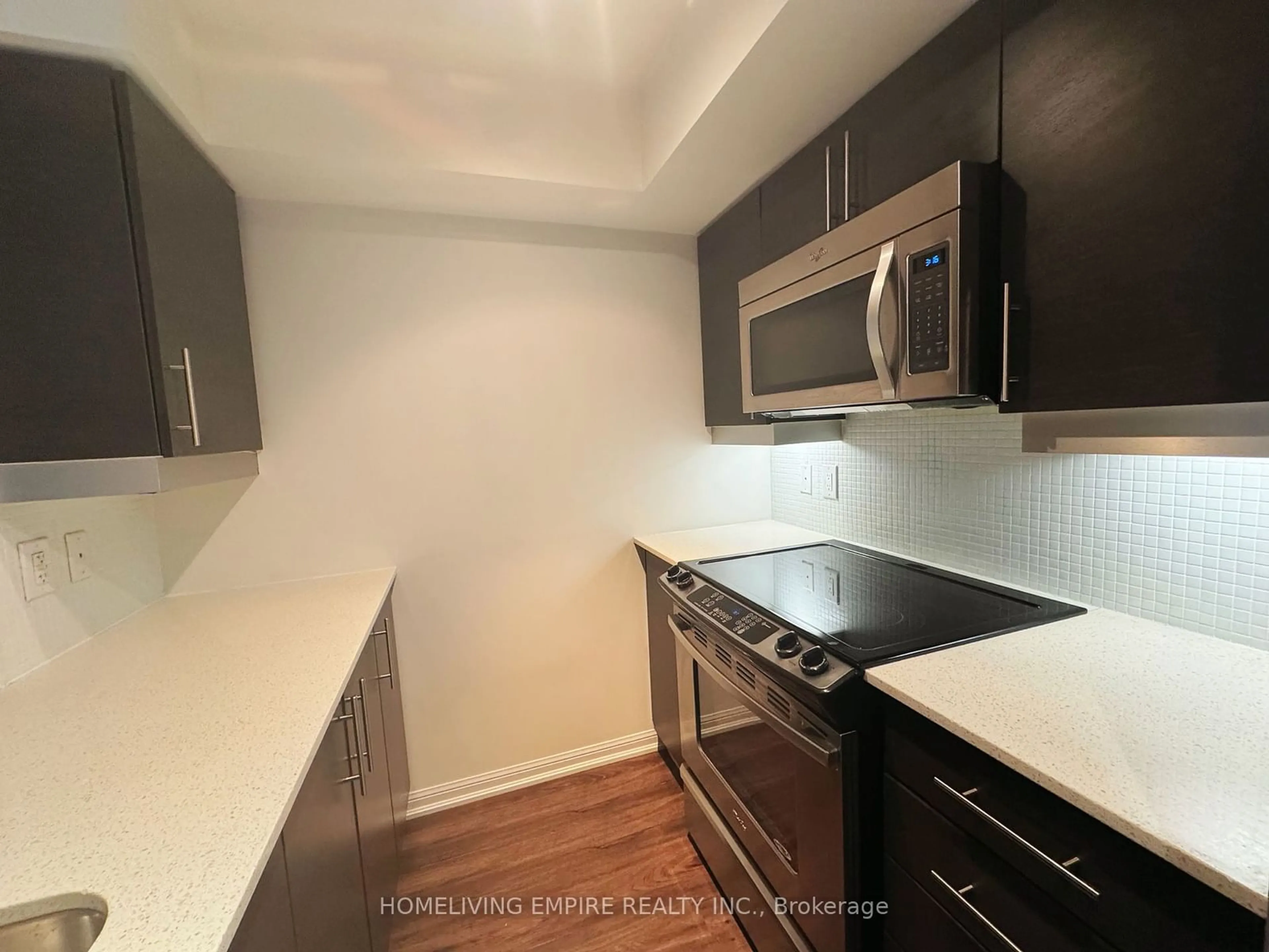 Standard kitchen, wood/laminate floor for 38 Grand Magazine St #642, Toronto Ontario M5V 0B1