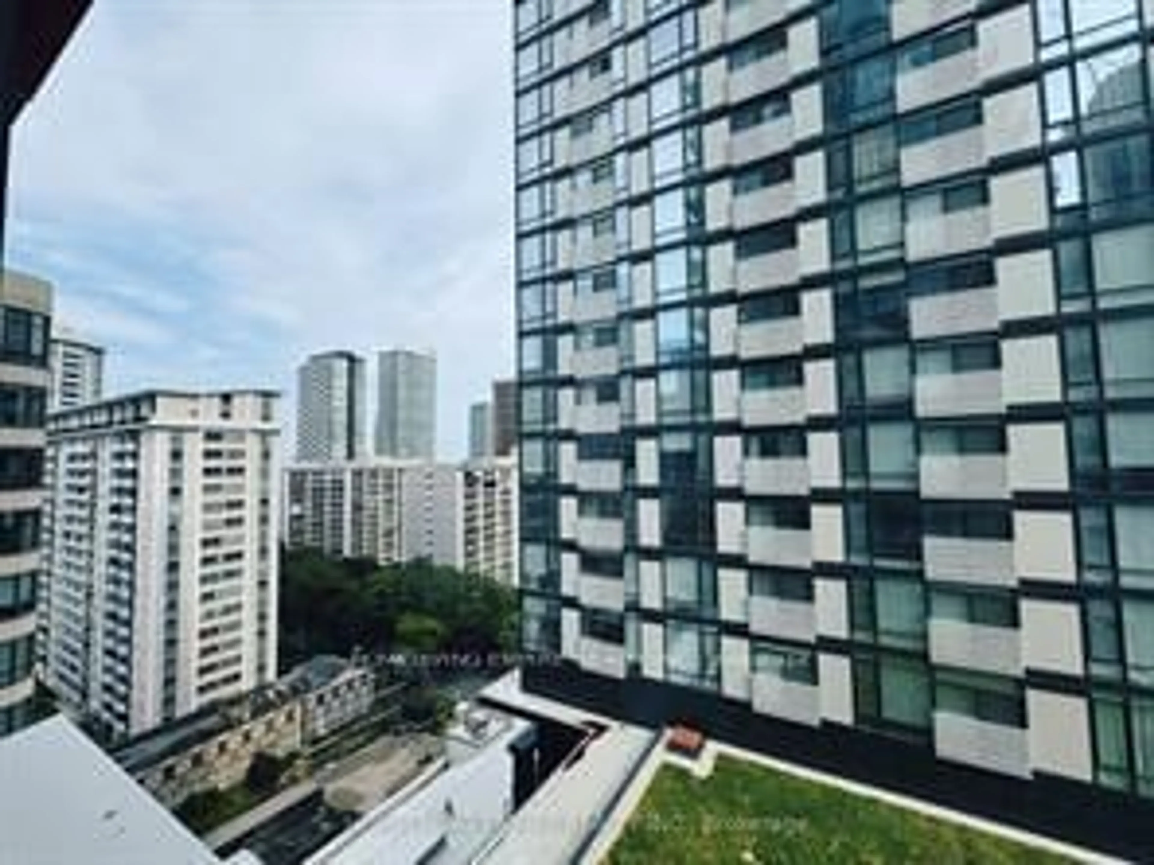 A pic from outside/outdoor area/front of a property/back of a property/a pic from drone, city buildings view from balcony for 18 Maitland Terr #1204, Toronto Ontario M4Y 0H2