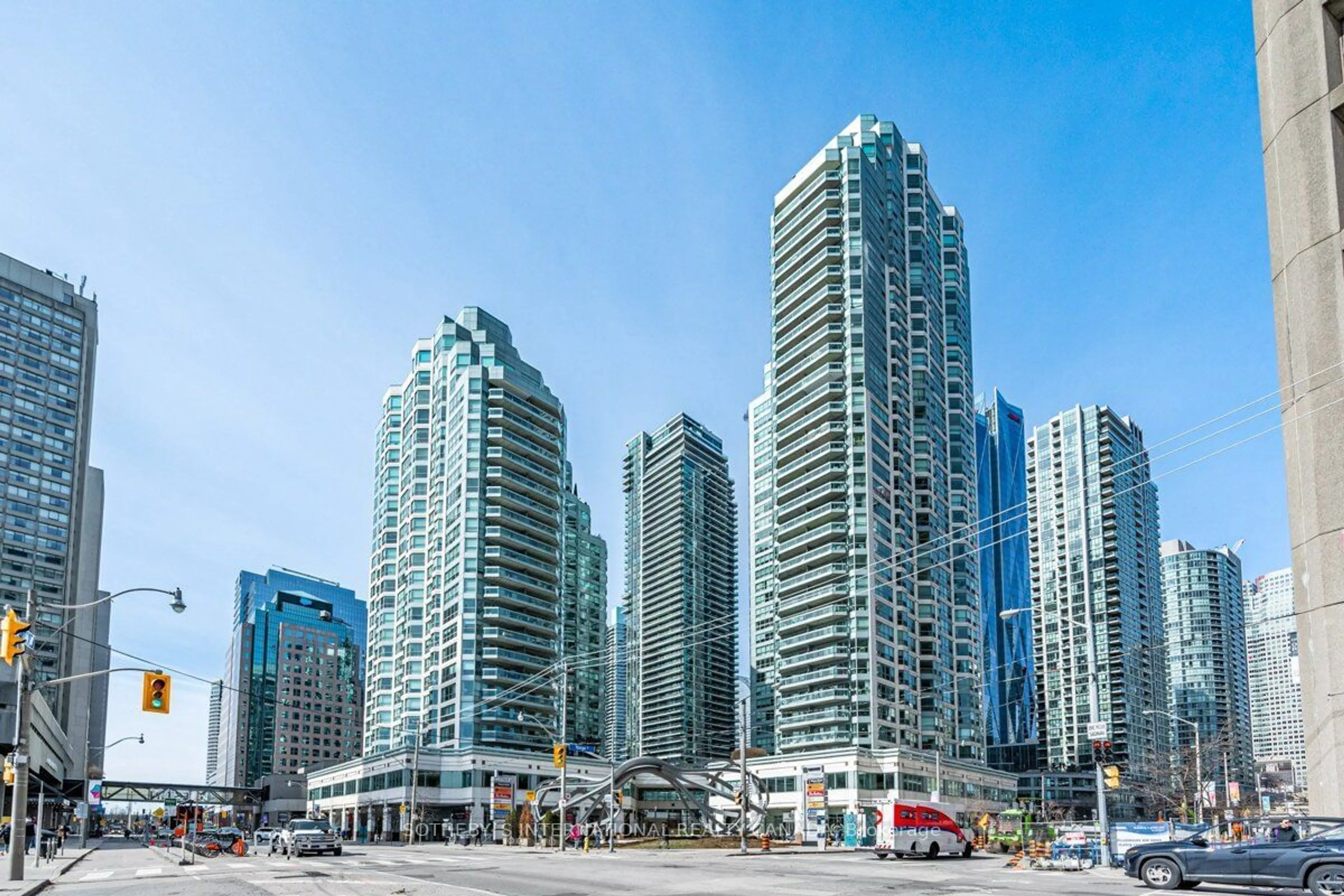 Patio, city buildings view from balcony for 10 Queens Quay #2305, Toronto Ontario M5J 2R9