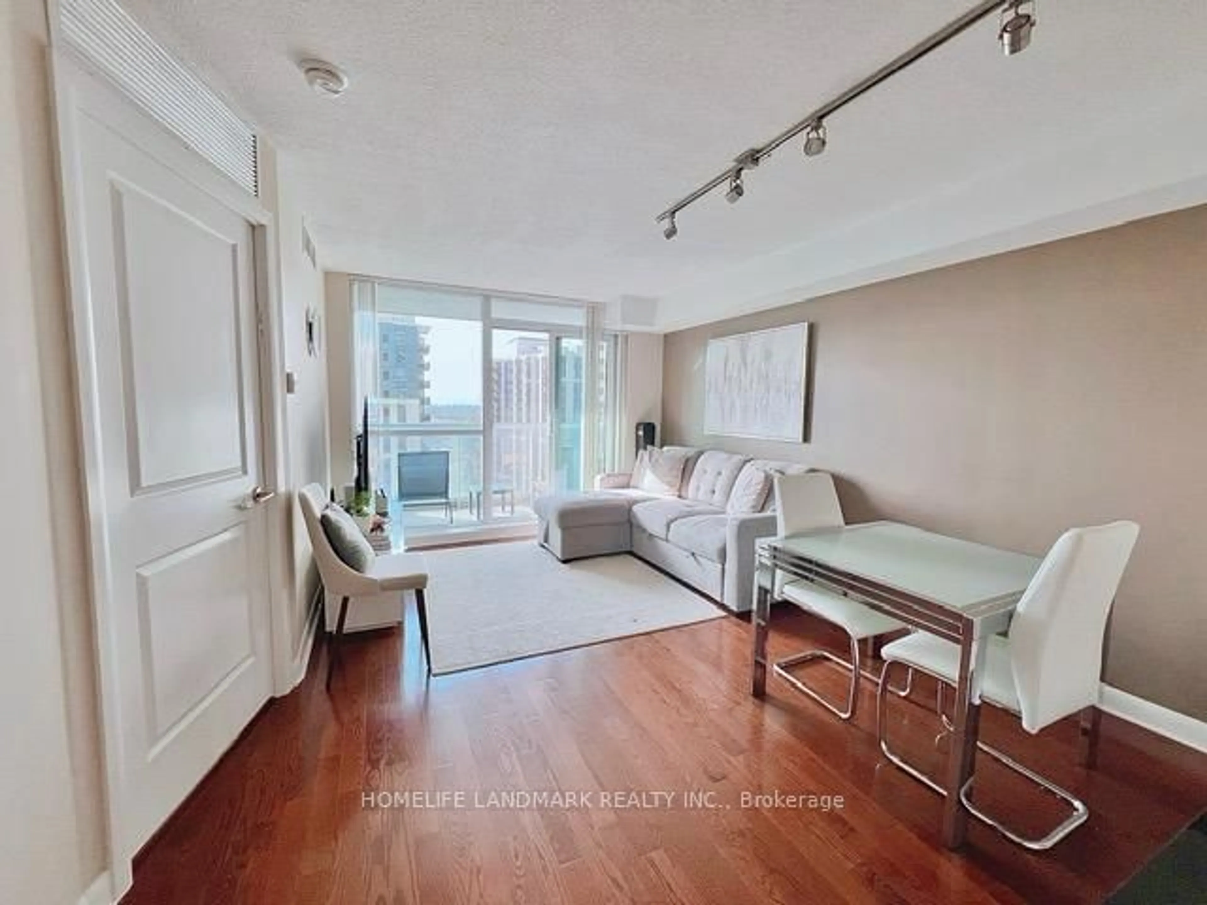 Living room with furniture, wood/laminate floor for 4968 Yonge St #2601, Toronto Ontario M2N 7G9