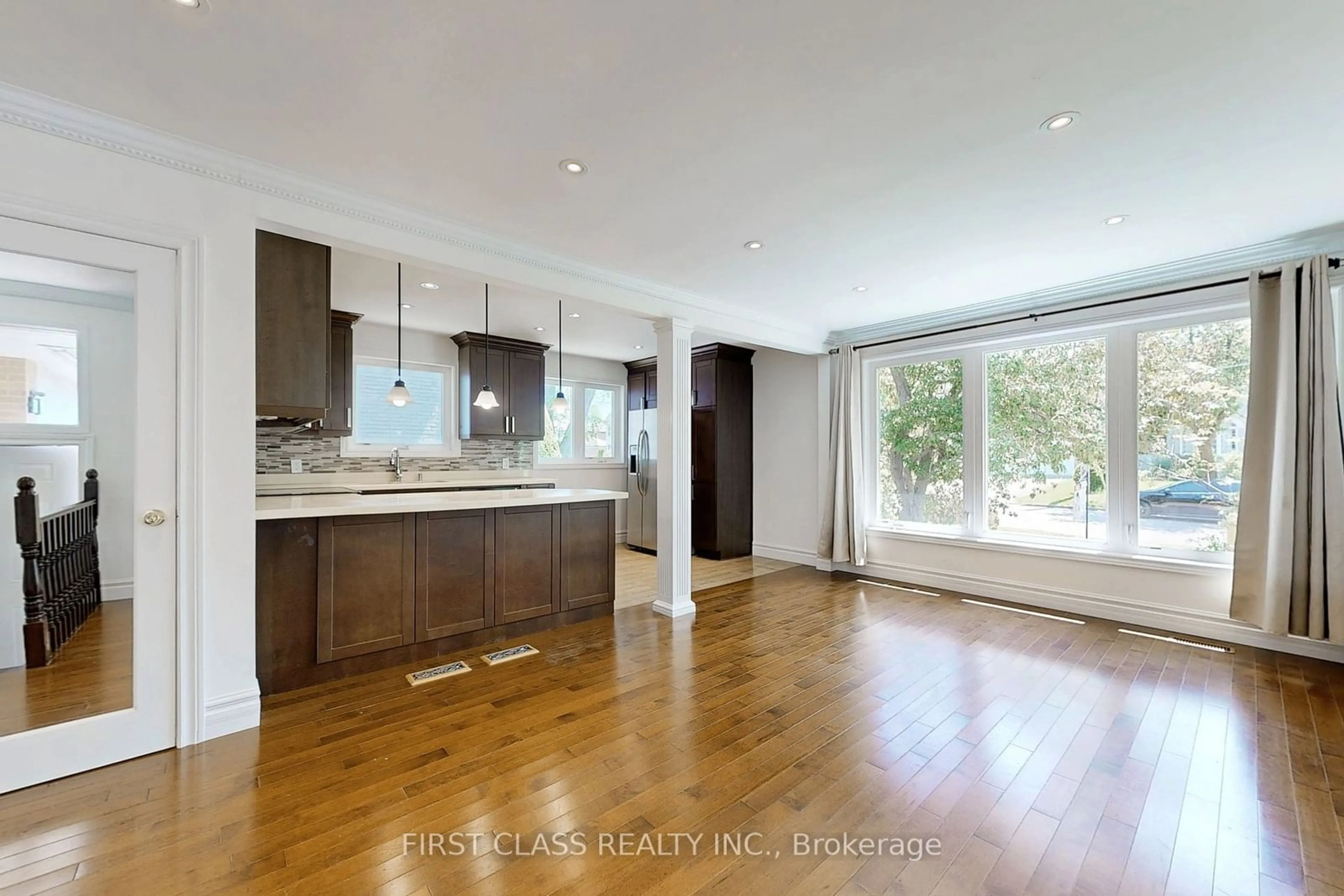 Open concept kitchen, wood/laminate floor for 204 Pemberton Ave, Toronto Ontario M2M 1Y8