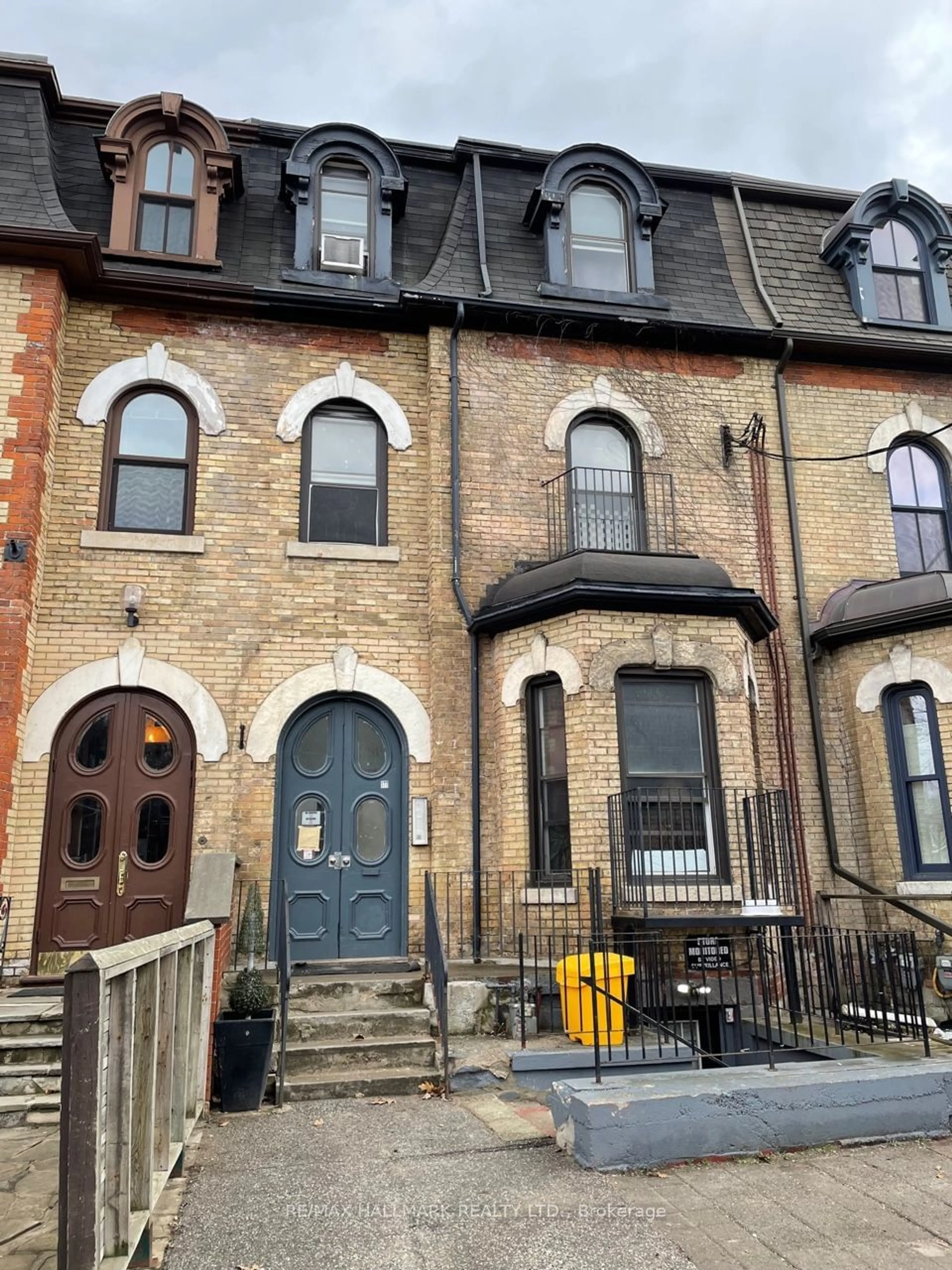 Home with brick exterior material, street for 177 Carlton St, Toronto Ontario M5A 2K3