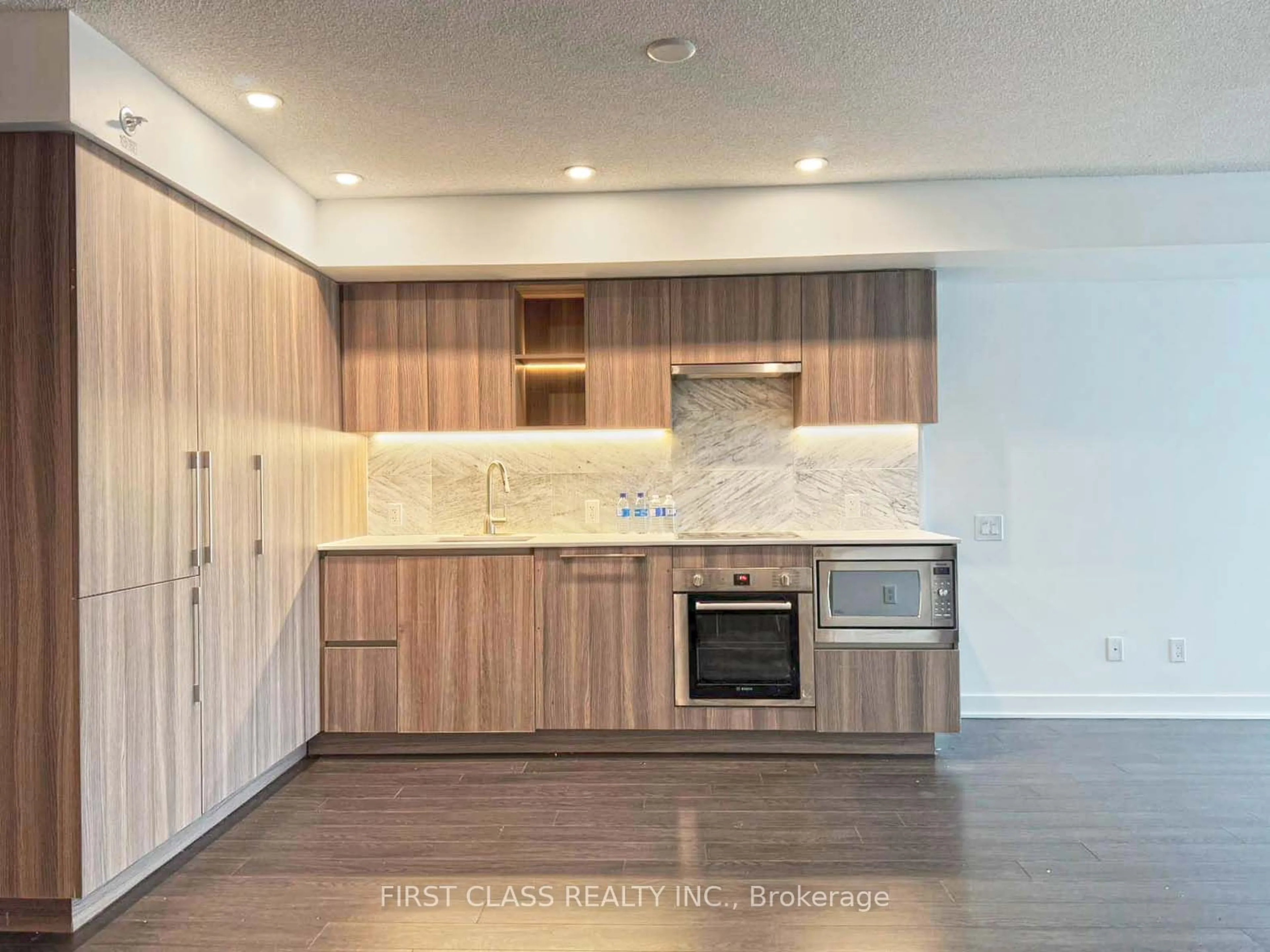 Open concept kitchen, wood/laminate floor for 19 Bathurst St St #2008, Toronto Ontario M5V 0N2