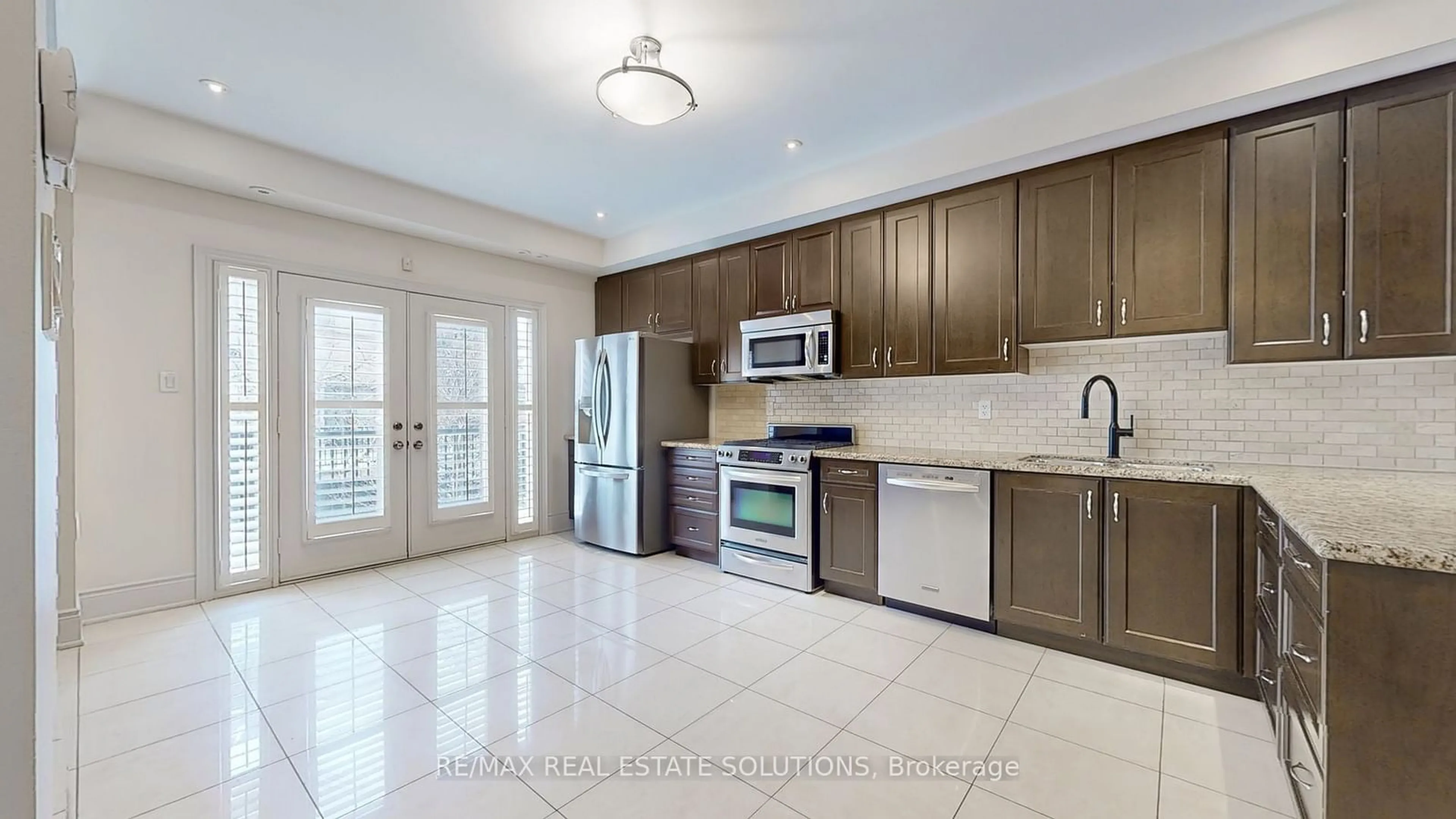 Open concept kitchen, ceramic/tile floor for 30 Mallingham Crt, Toronto Ontario M2N 0C7