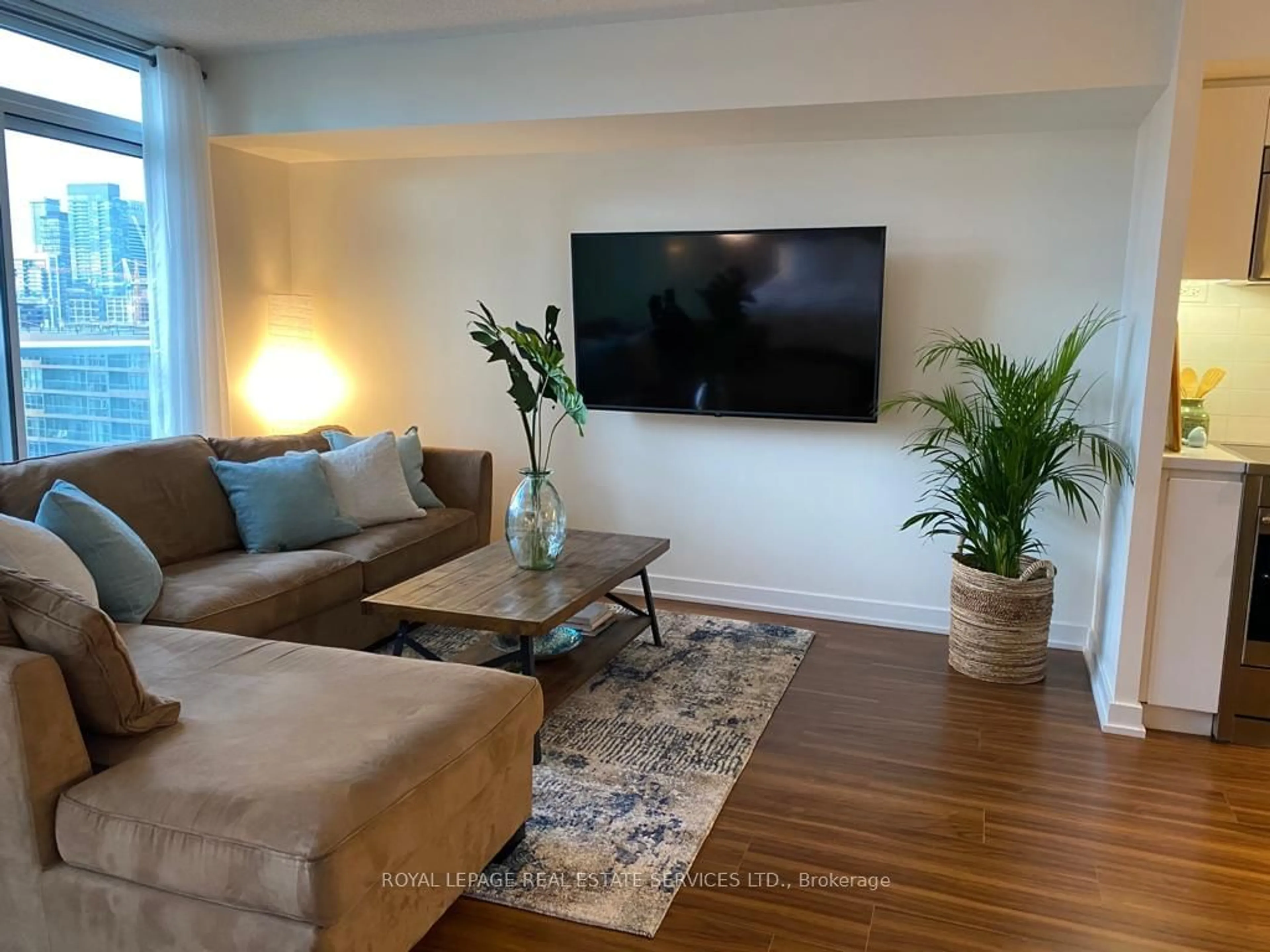 Living room with furniture, wood/laminate floor for 85 Queens Wharf Rd #1511, Toronto Ontario M5V 0J9