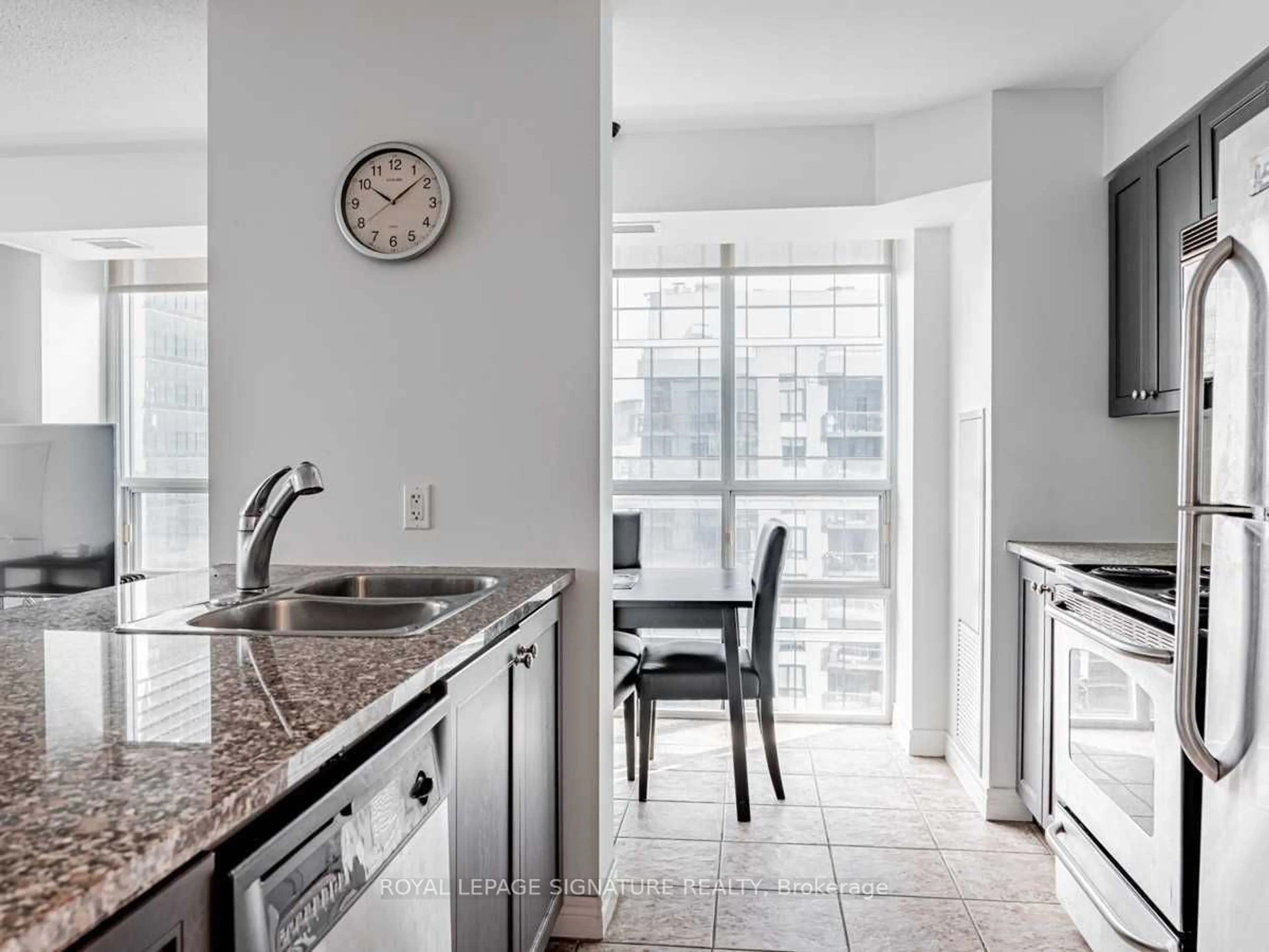 Open concept kitchen, ceramic/tile floor for 30 Grand Trunk Cres #3906, Toronto Ontario M5J 3A4