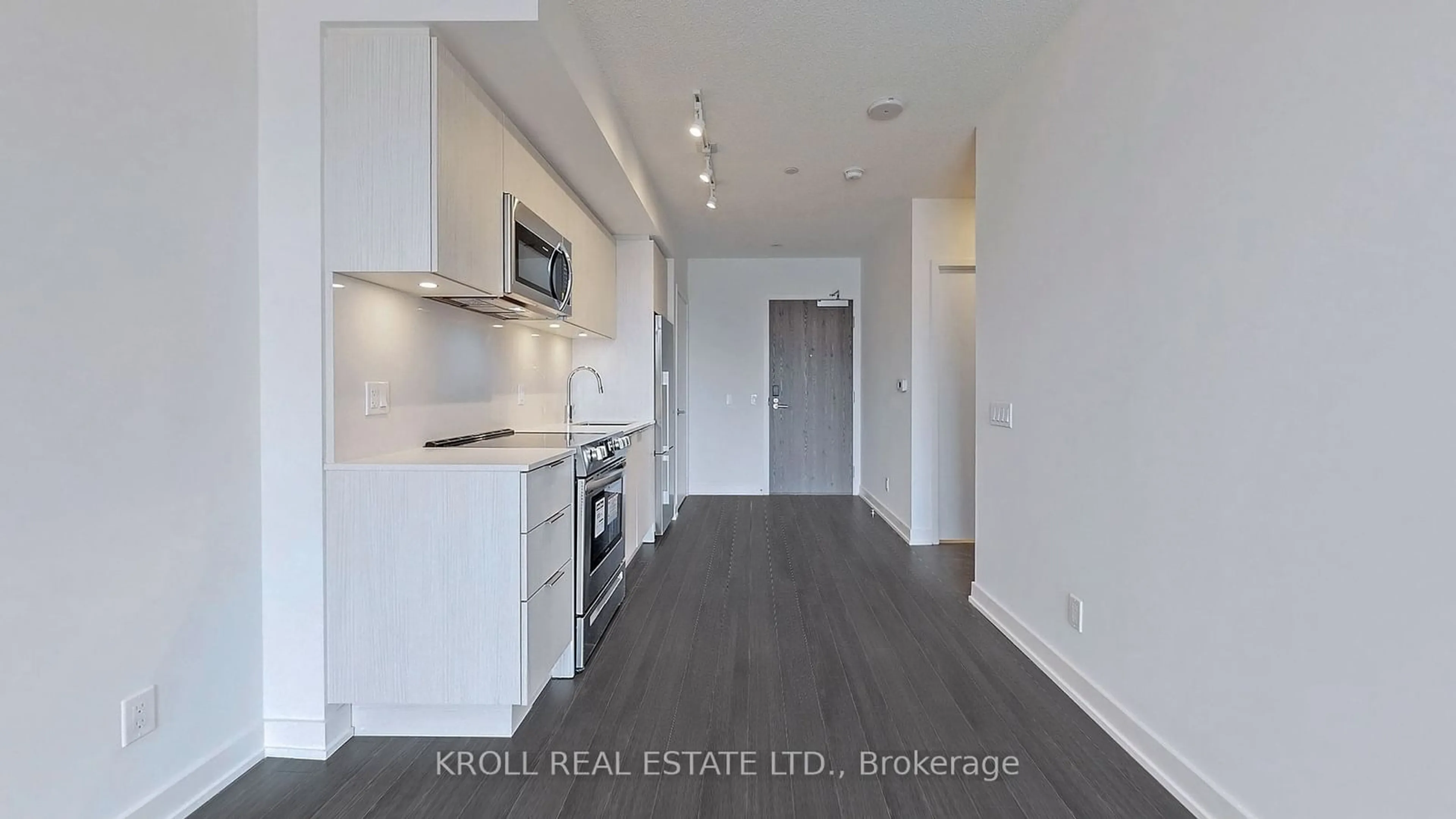 Open concept kitchen, wood/laminate floor for 25 Richmond St #201, Toronto Ontario M5C 0A6