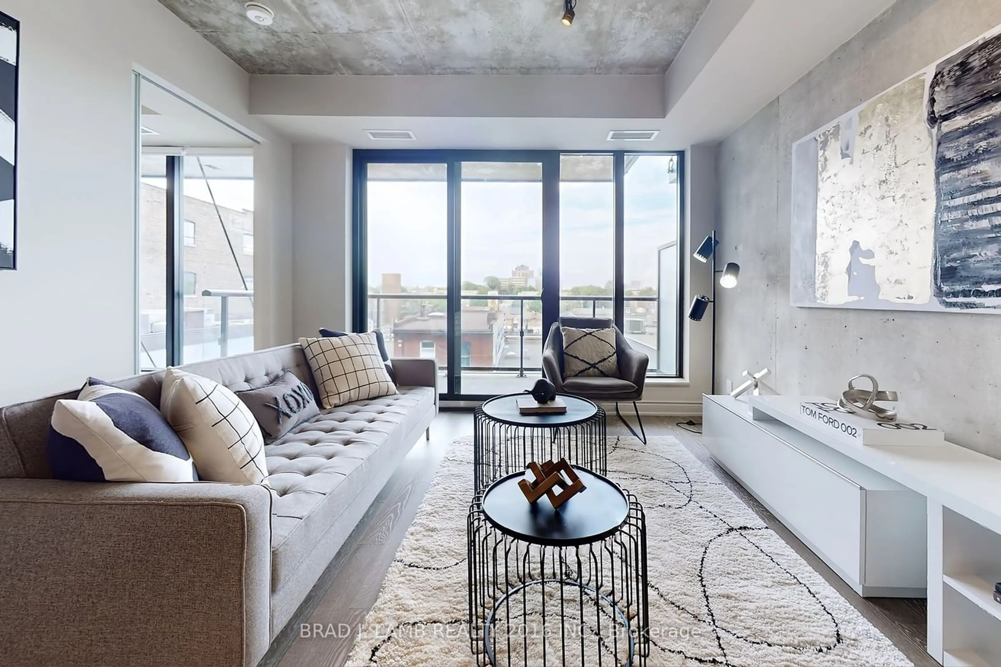 Living room with furniture, cement floor for 608 Richmond St #520, Toronto Ontario M5V 0N9